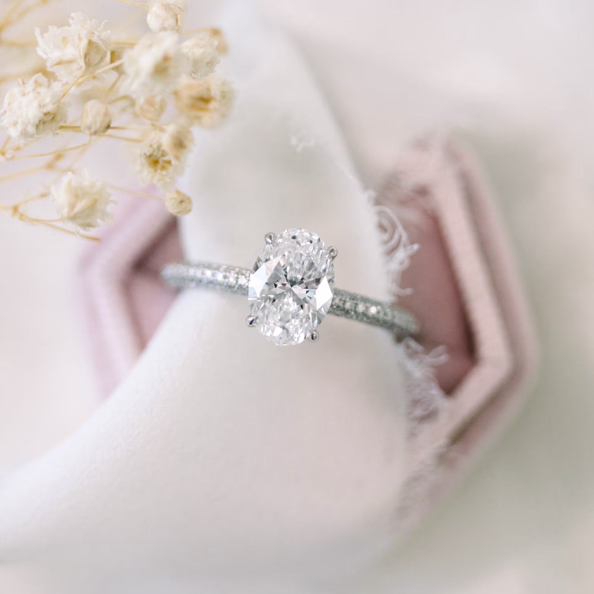 platinum micro pave engagement ring with 1.75ct lab diamond oval