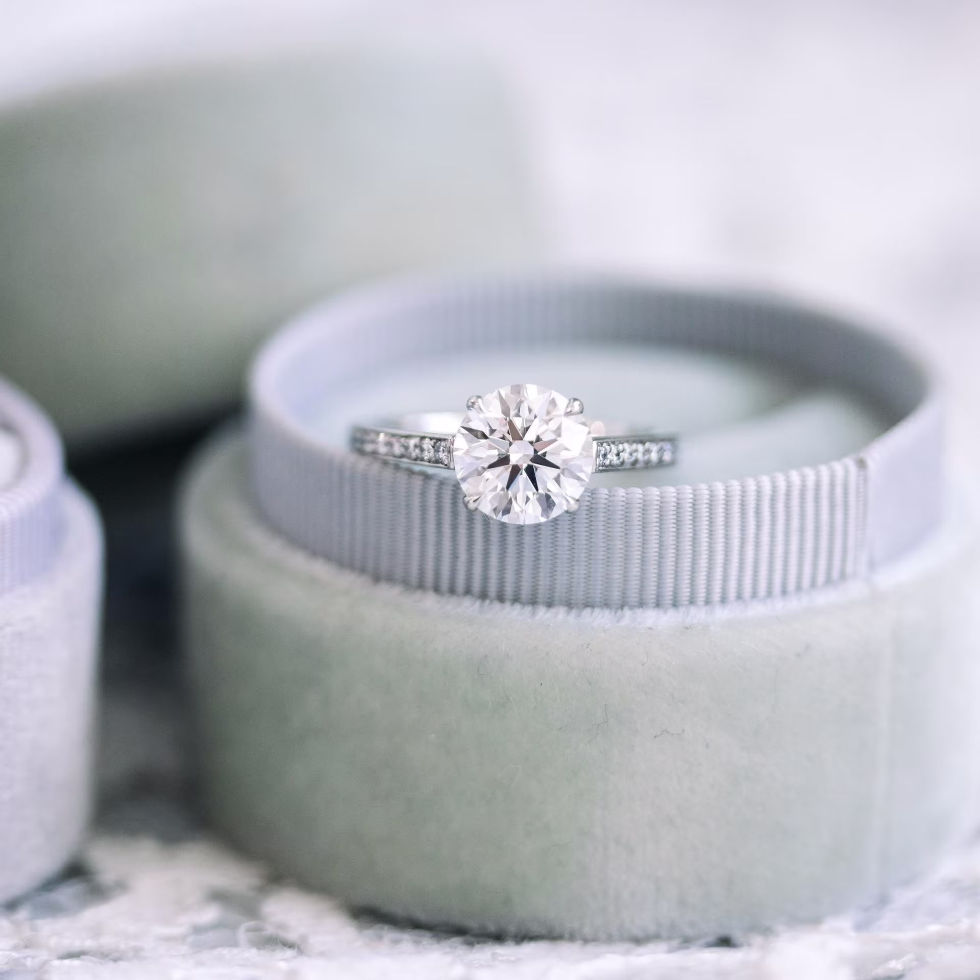 2 ct round four prong cathedral channel setting made in platinum engagement ring made with laboratory grown diamonds ADA Diamonds ad074