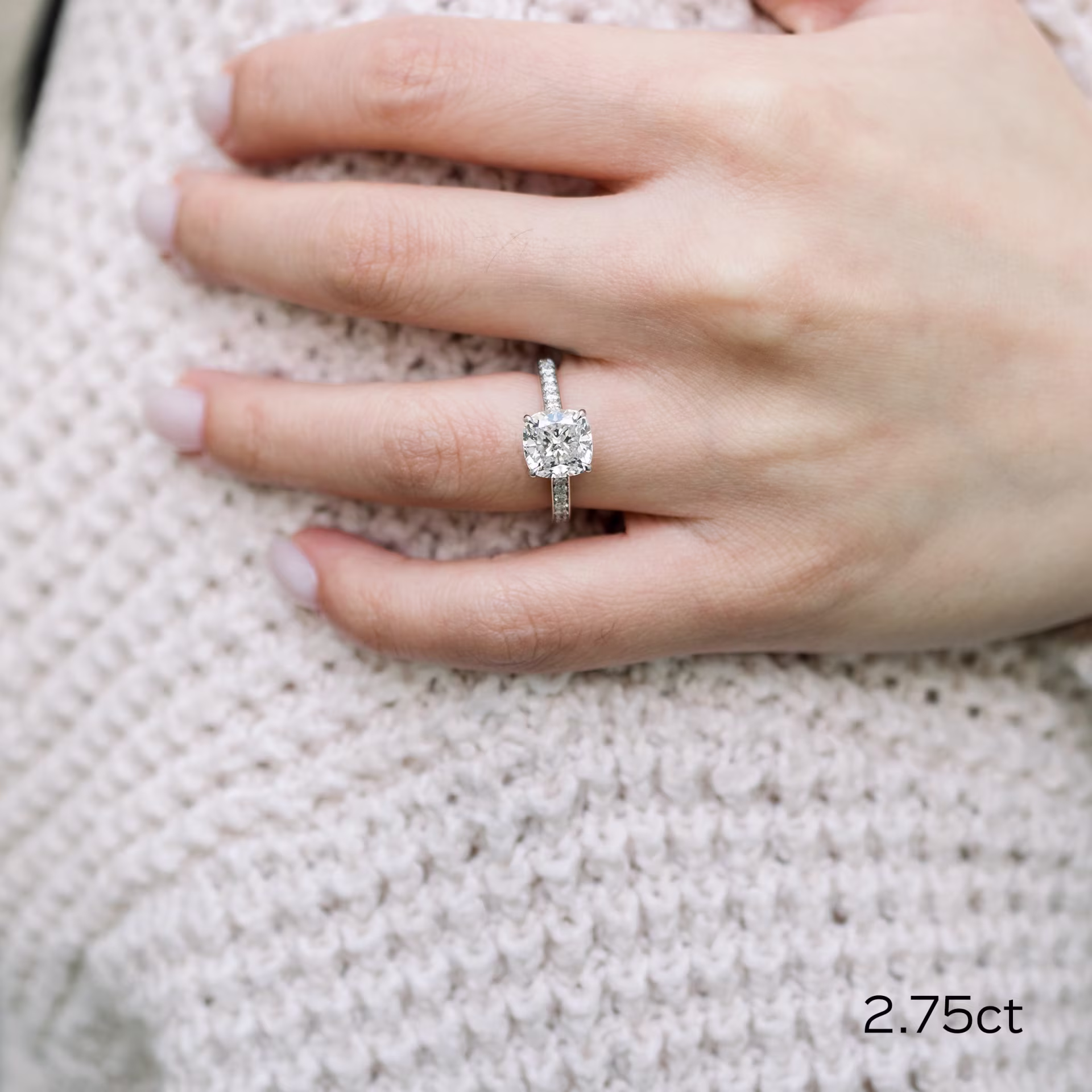 18k white gold 3 carat cushion cut lab diamond engagement ring with channel set pavé band ada diamonds design ad 074 on model