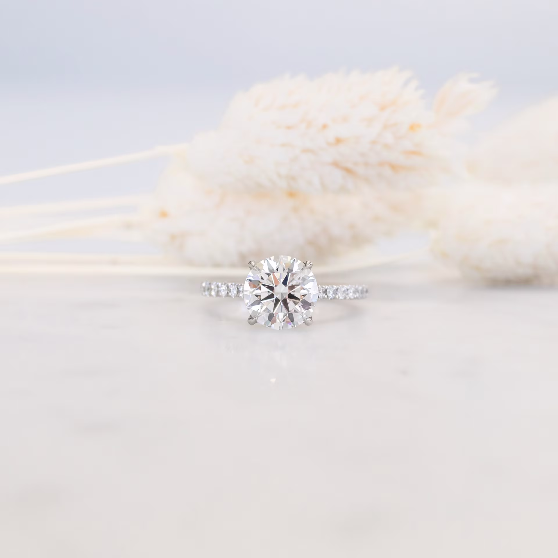 lab created round diamond in cathedral pave setting