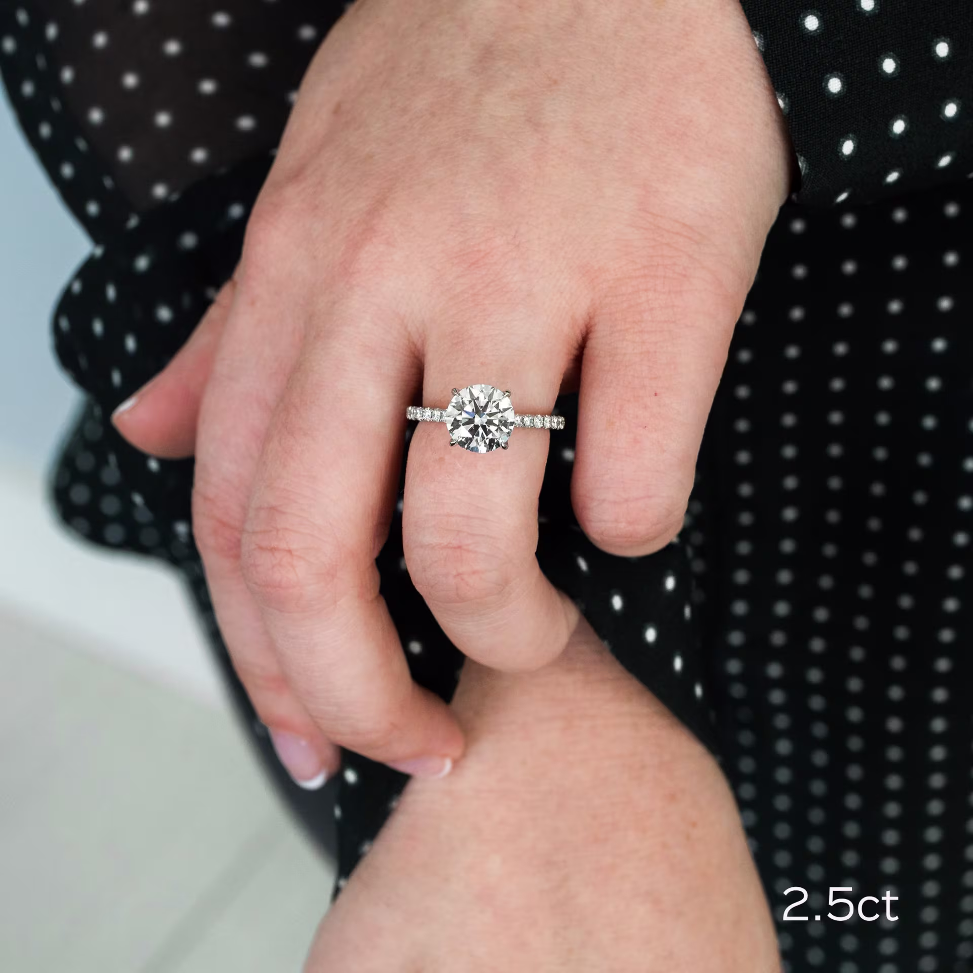 2 and a half carat lab diamond in a pave setting