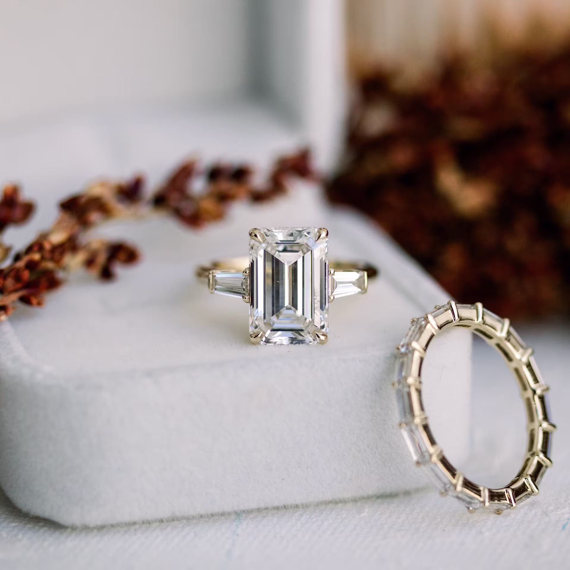 custom yellow gold 5ct lab diamond wedding set with emerald and baguette engagement ring and baguette wedding band ada diamonds design ad 464 and ad499