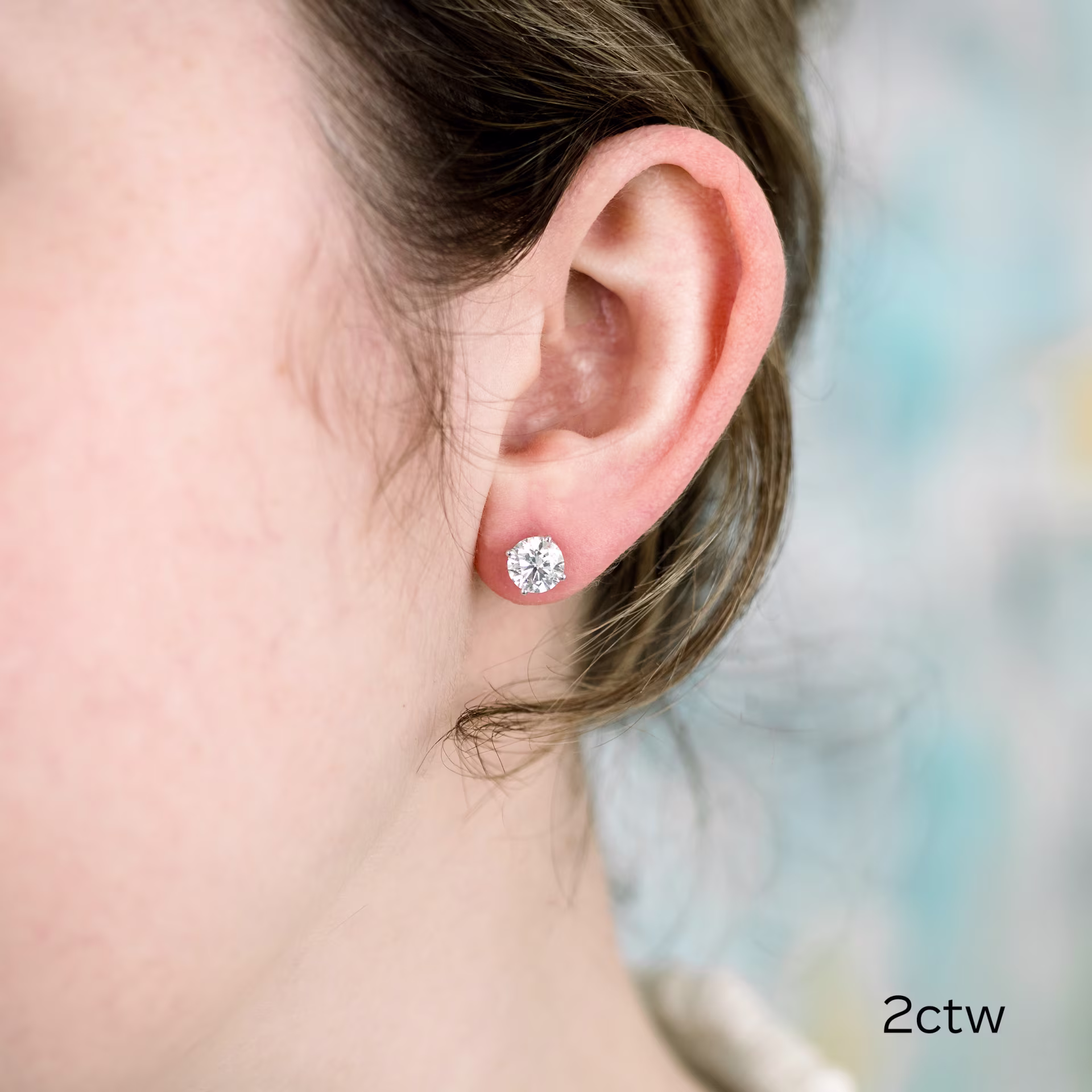 High Quality 2.0 ctw Diamonds set in 14k White Gold Round Stud Earrings (Main View)