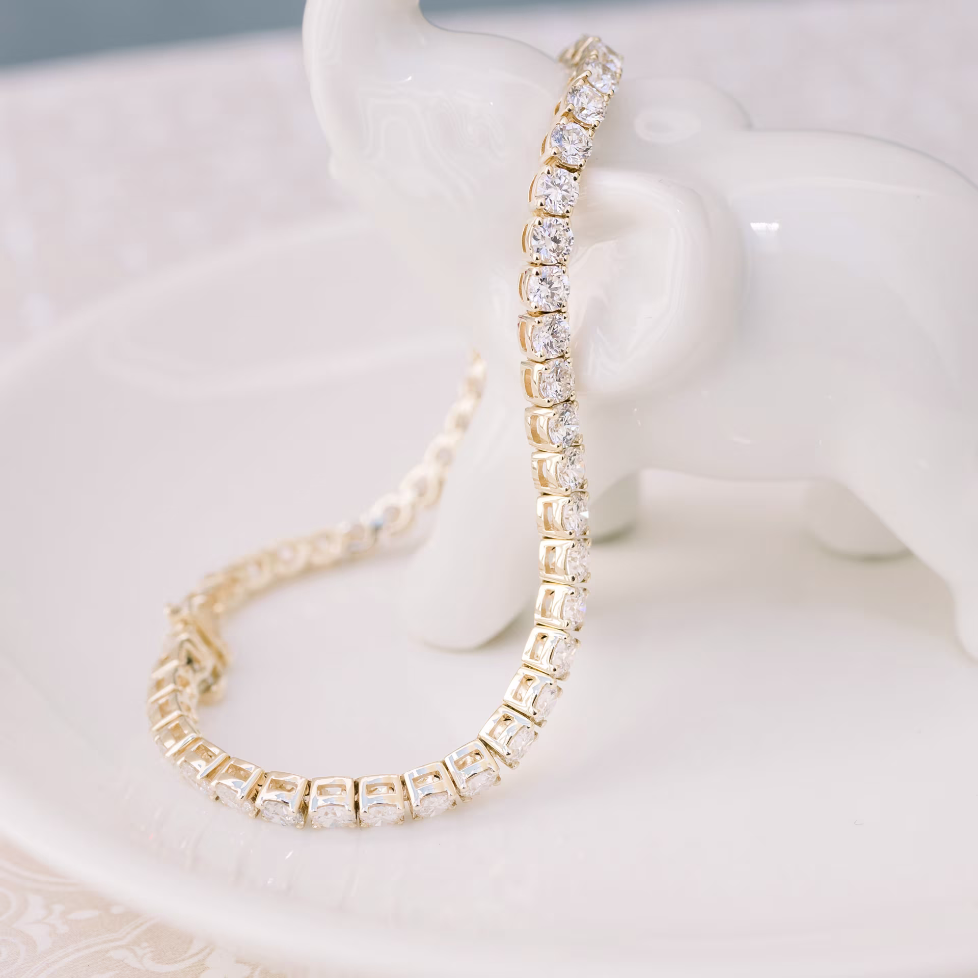 6.0 Carat Round Diamonds set in 14k Yellow Gold Four Prong Round Diamond Tennis Bracelet (Side View)