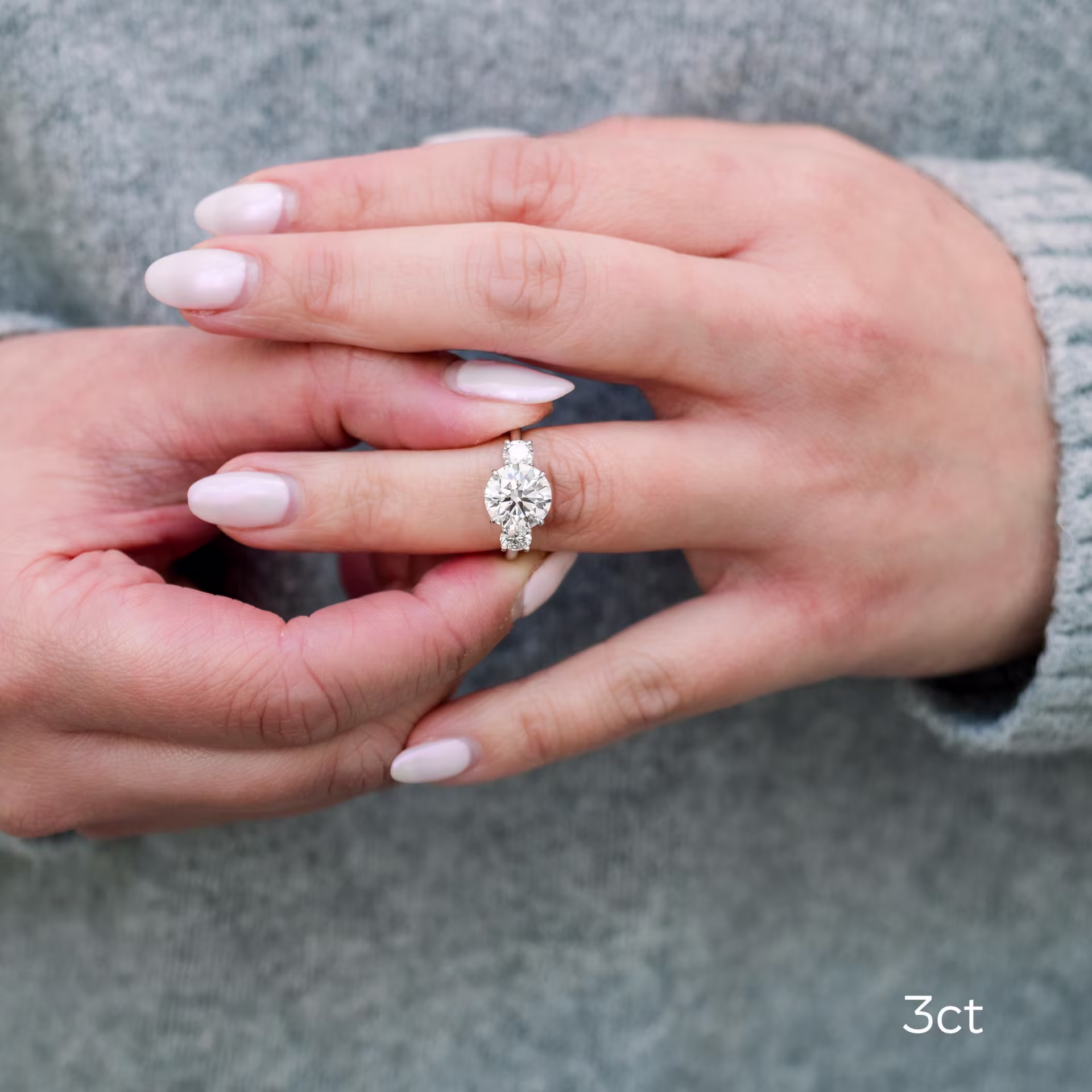 18k white gold ideal round 3 carat lab grown diamond with round side stones on model Ada Diamonds Design AD-070