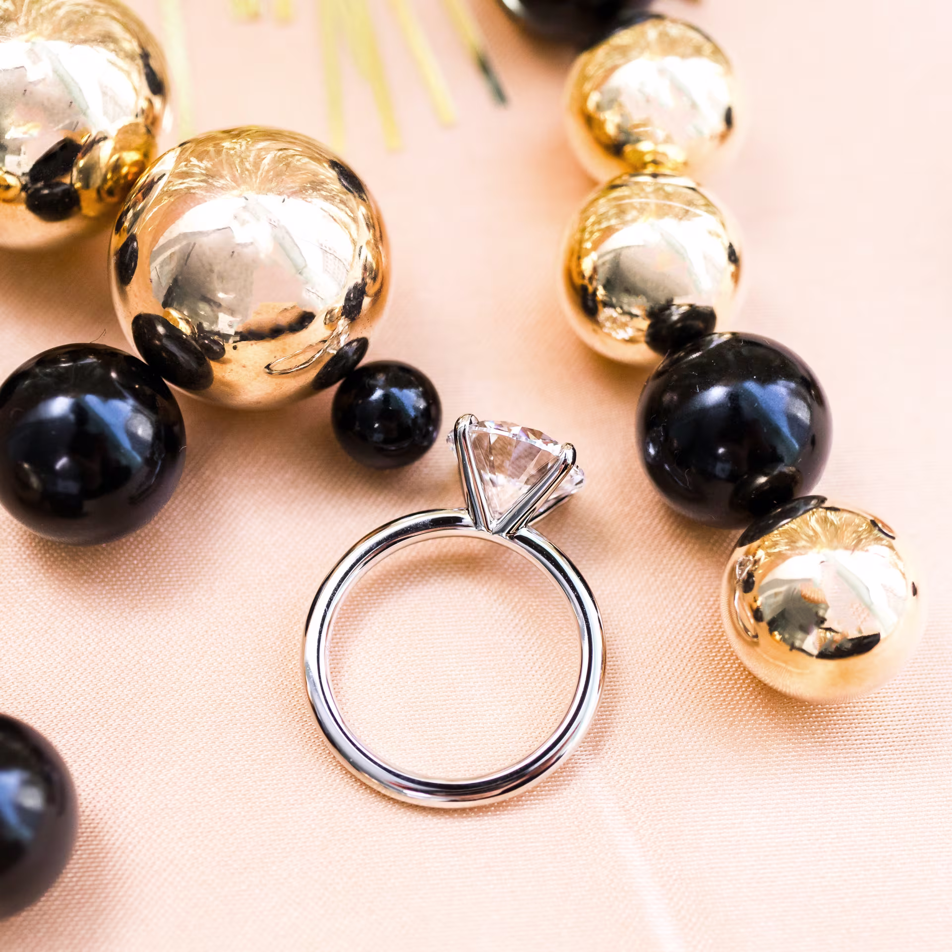 Platinum Round Classic Four Prong Solitaire Diamond Engagement Ring featuring Hand Selected Diamonds (Profile View)