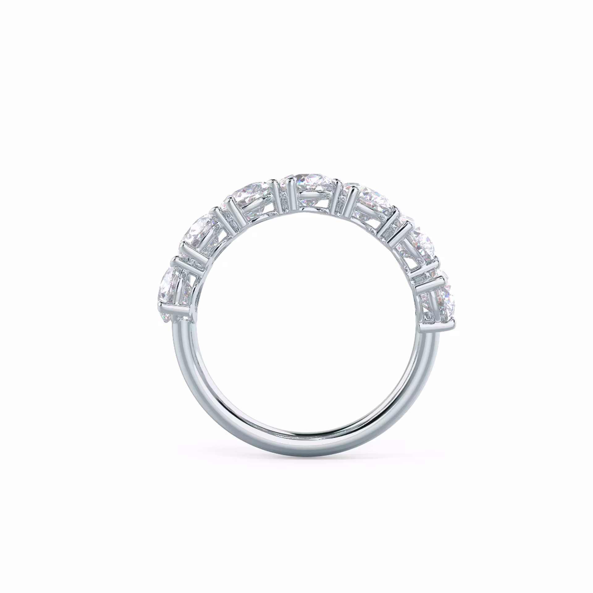 18 Karat White Gold Pear Angled Seven Stone featuring Exceptional Quality 3.5 ct Diamonds (Profile View)