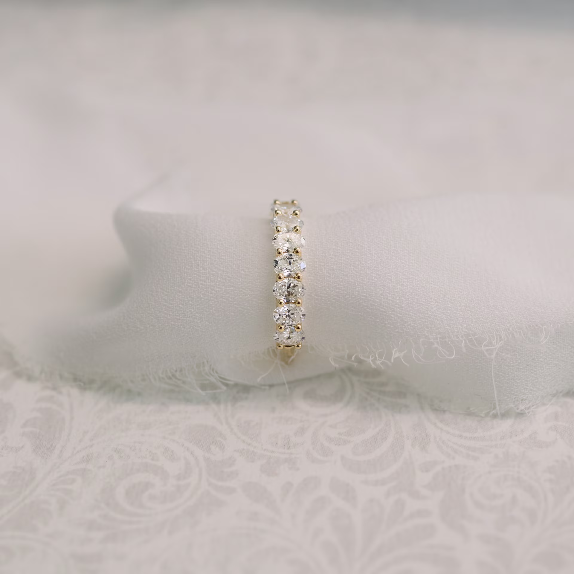 1.7 ct Lab Diamonds set in 18k Yellow Gold Oval French U Three Quarter Band in 18k Yellow Gold 1.7ctw (Profile View)