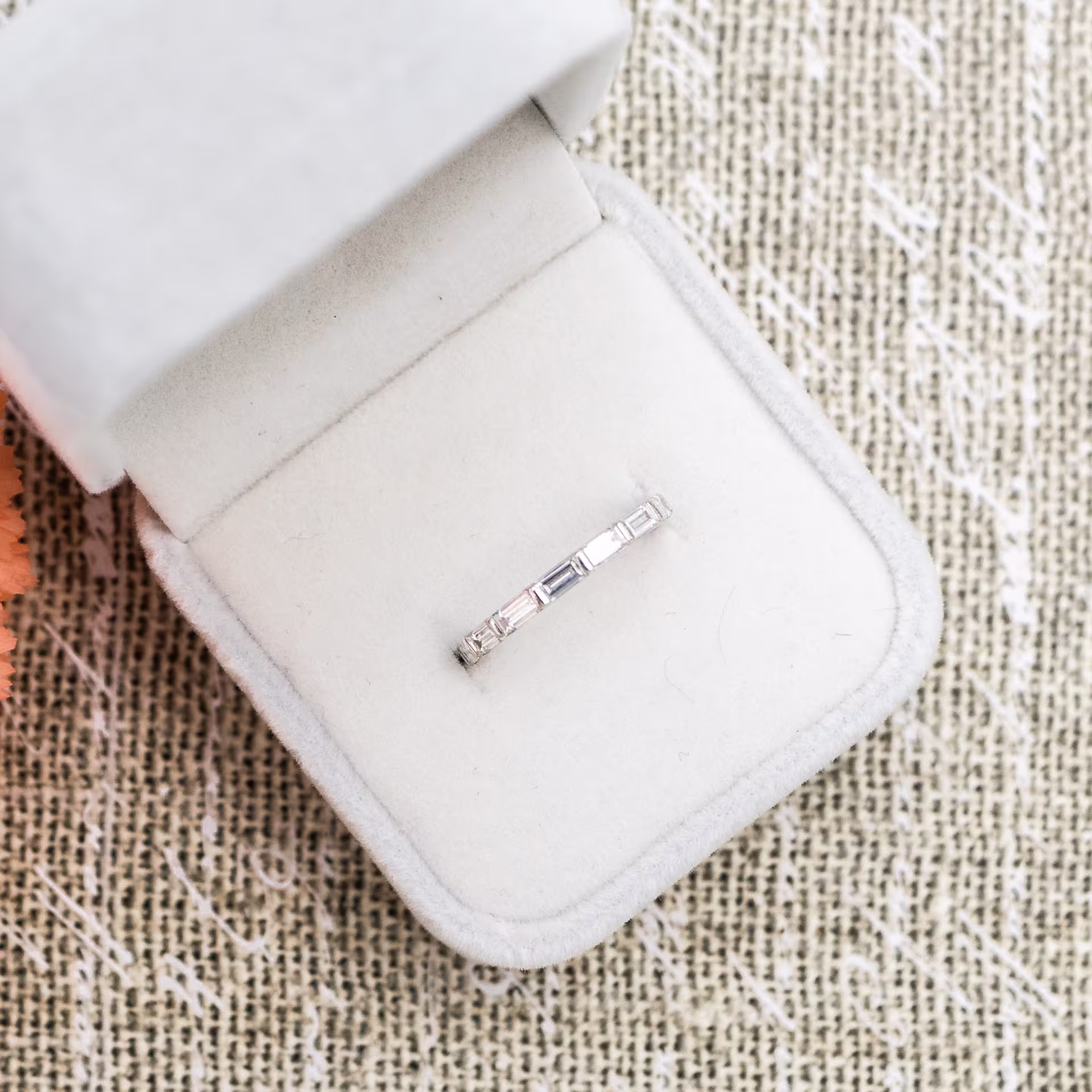 18k White Gold Baguette East-West Eternity Band in 18k White Gold 2.4ctw featuring 2.4 Carat Man Made Diamonds (Main View)