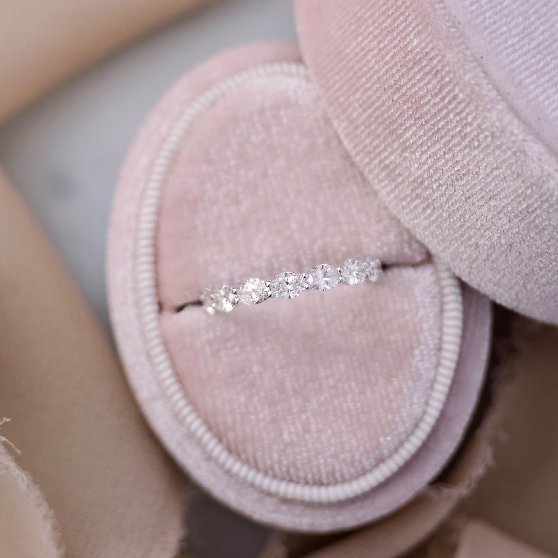 Platinum Oval East-West Three Quarter Band featuring 1.65 Carat Lab Diamonds (Profile View)