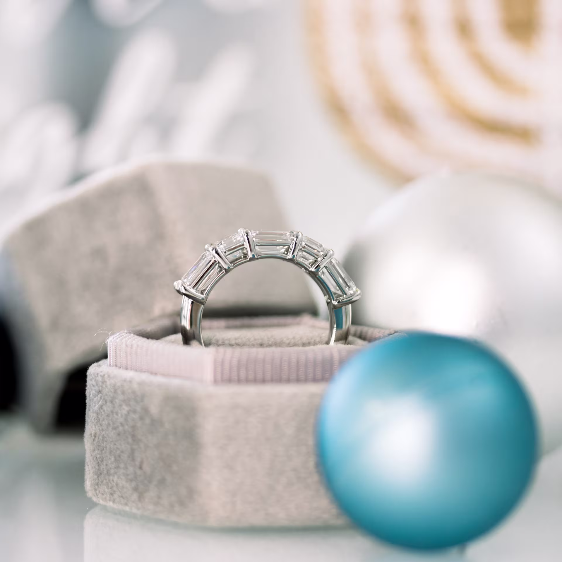 Platinum Emerald and Asscher East-West Five Stone featuring 2.6 ct Synthetic Diamonds (Profile View)