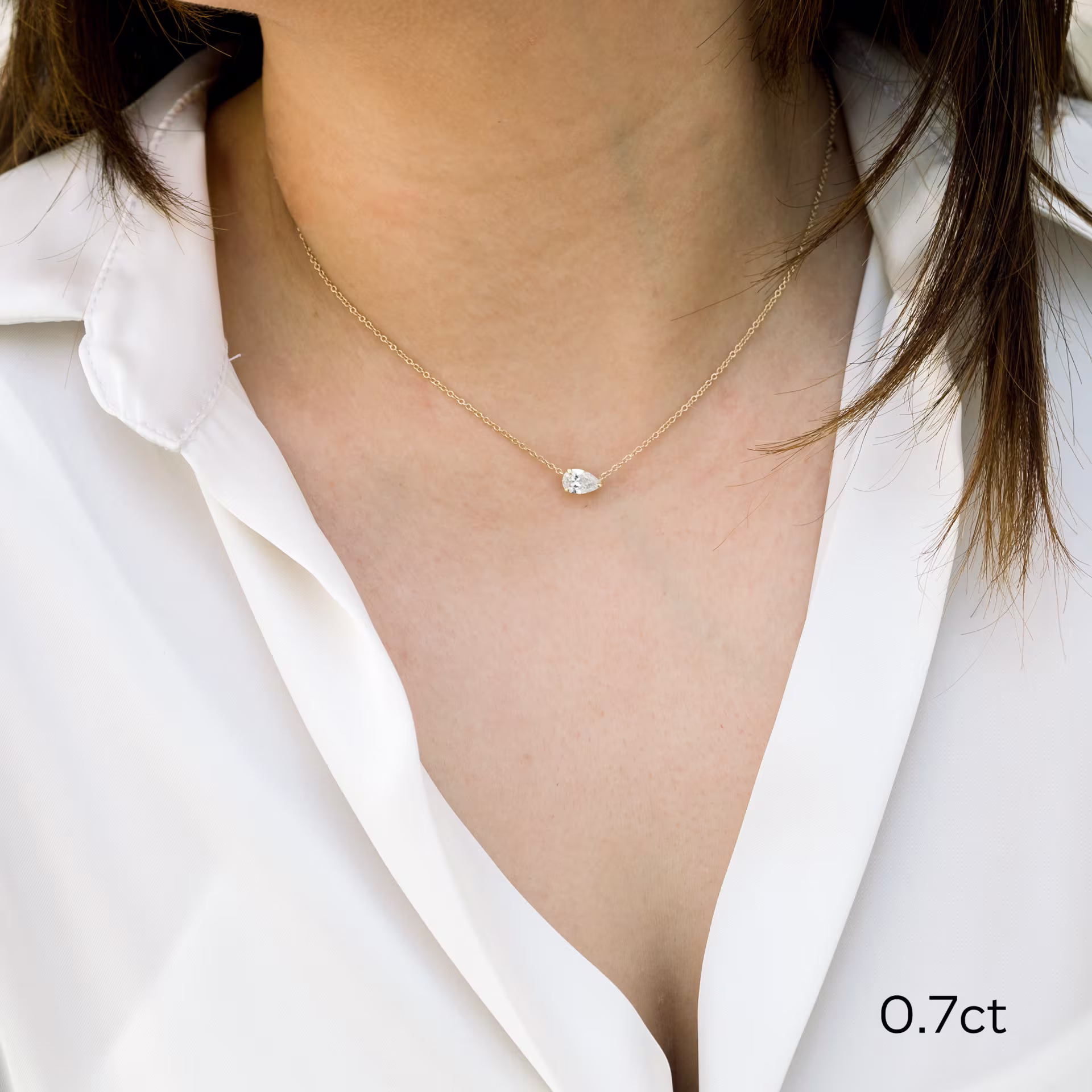 14 Karat Yellow Gold Floating Pear Pendant featuring 0.7 ctw Lab Diamonds (Main View)