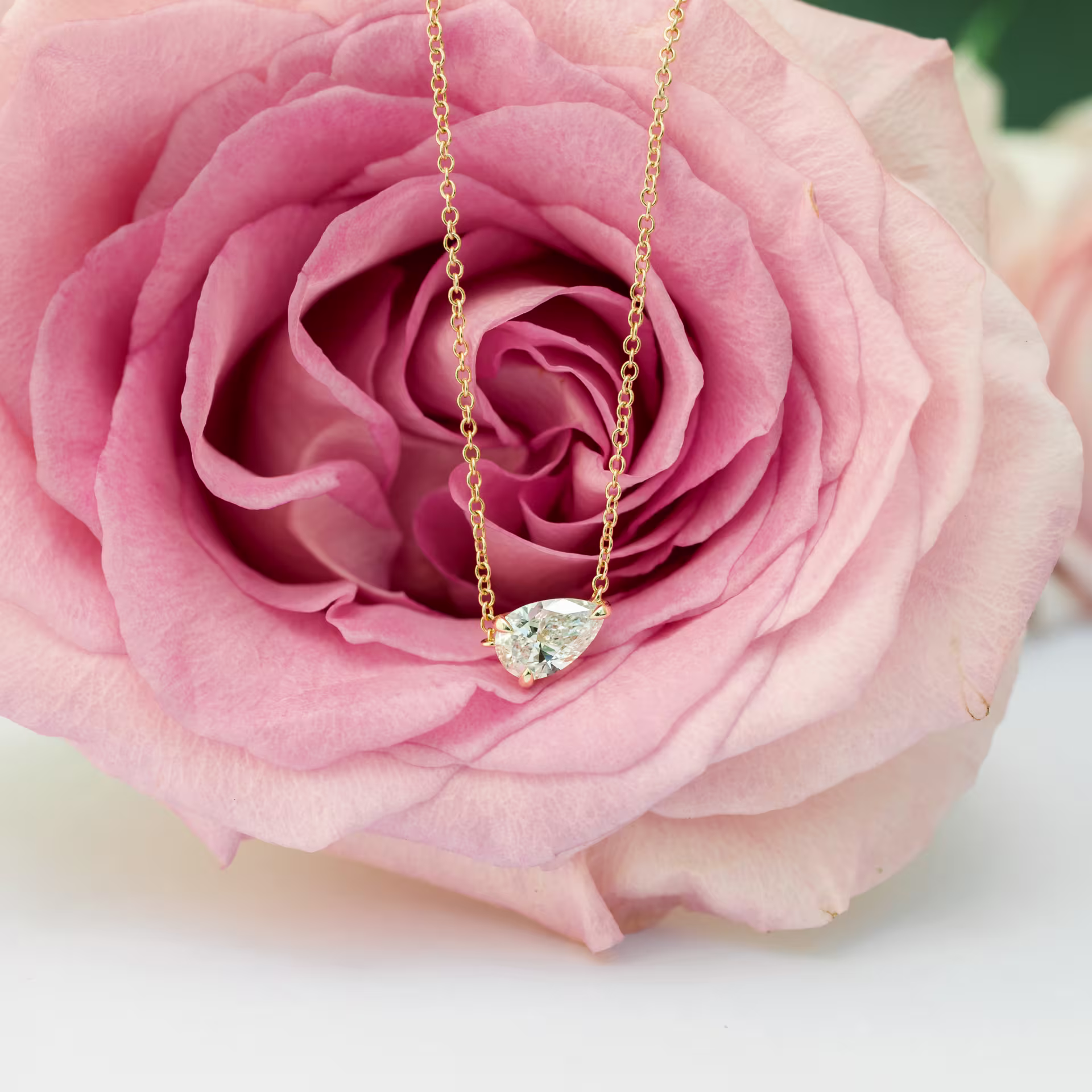 14k Yellow Gold Floating Pear Pendant featuring Exceptional Quality 0.7 ctw Diamonds (Main View)