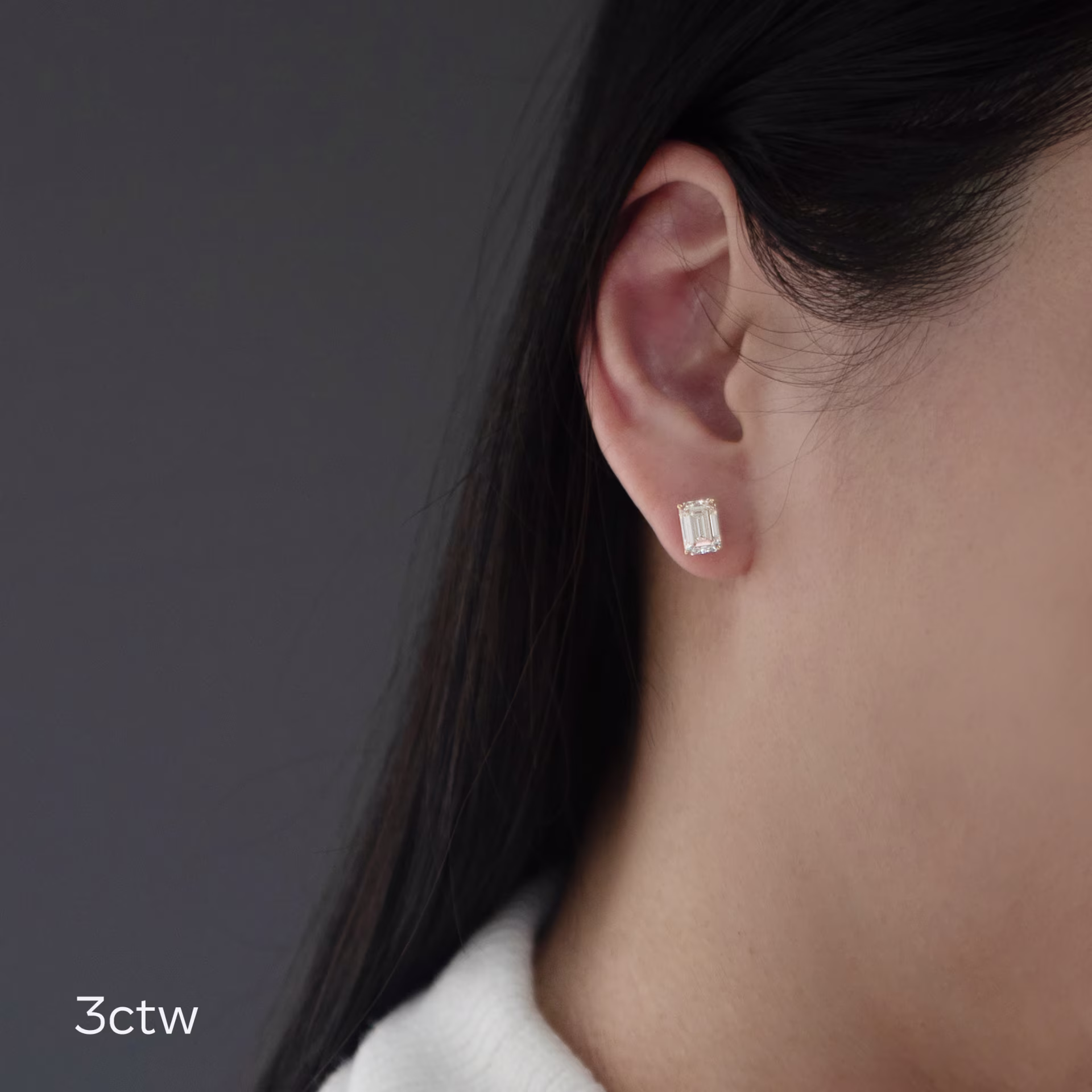 18kt Yellow Gold Emerald Cut Stud Earrings featuring 3.0 ct Man Made Diamonds (Main View)