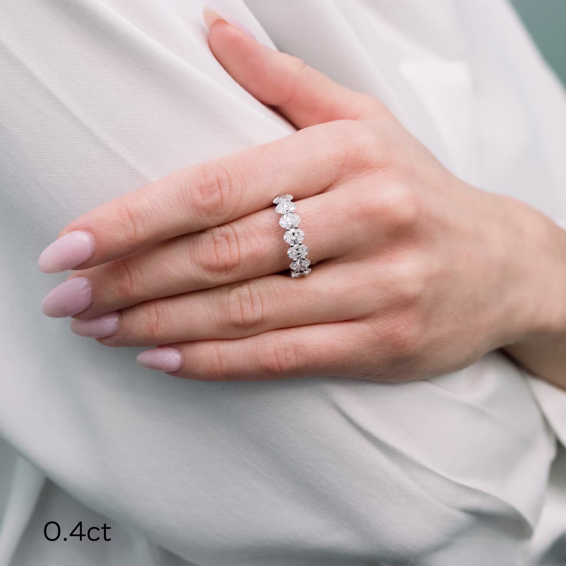 Exceptional Quality 6.0 ct Lab Grown Diamonds set in Platinum Oval French U Eternity Band (Profile View)