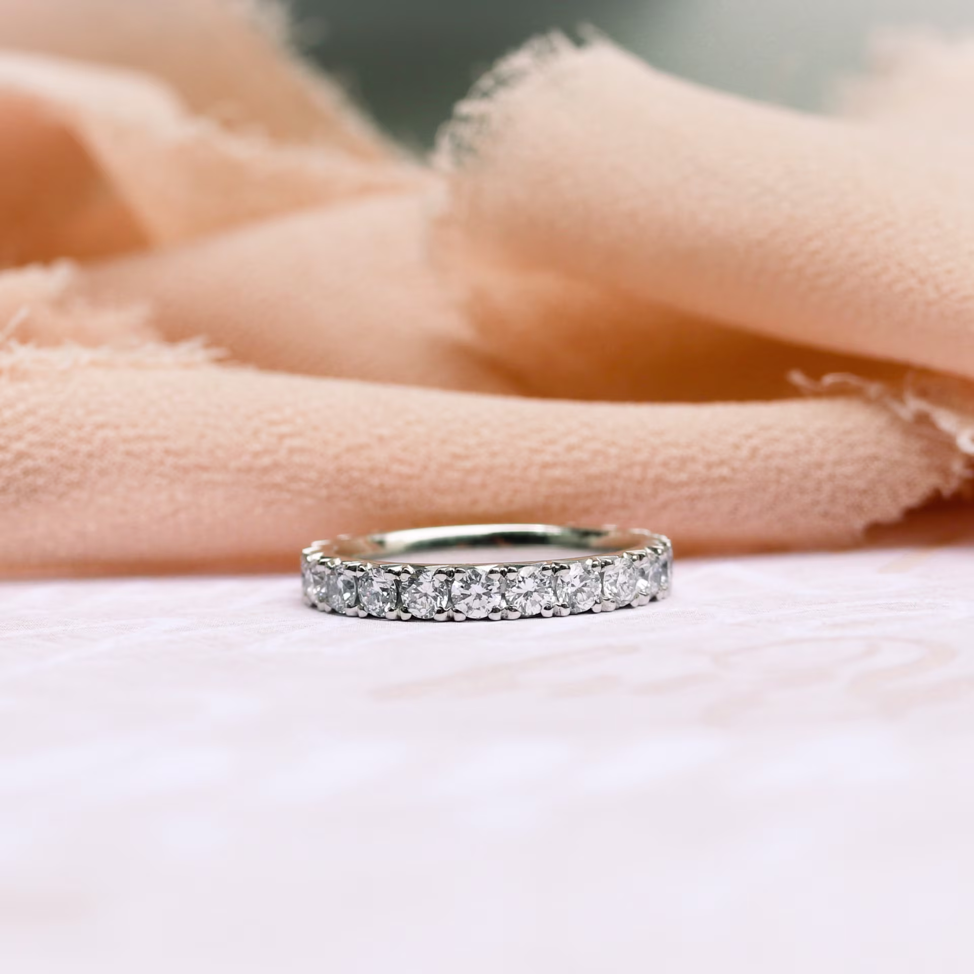 1.2 Carat Round Brilliant Created Diamonds set in Platinum French Pavé Eternity Band in Platinum 1.2ctw (Main View)