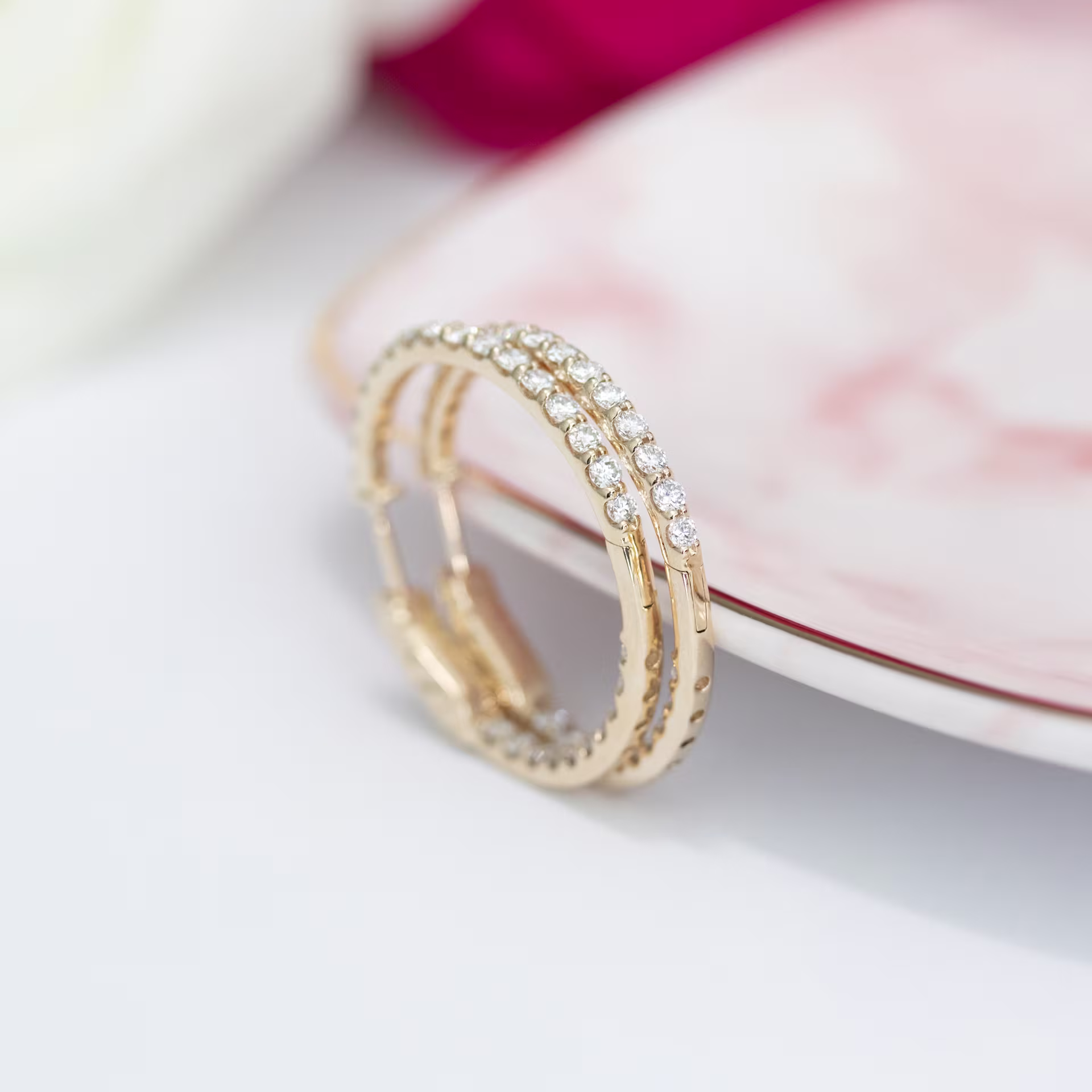 14 Karat Yellow Gold 1.75ctw Inside Out Diamond Hoop Earrings in 14k Yellow Gold featuring Hand Selected 1.75 ctw Round Diamonds (Profile View)