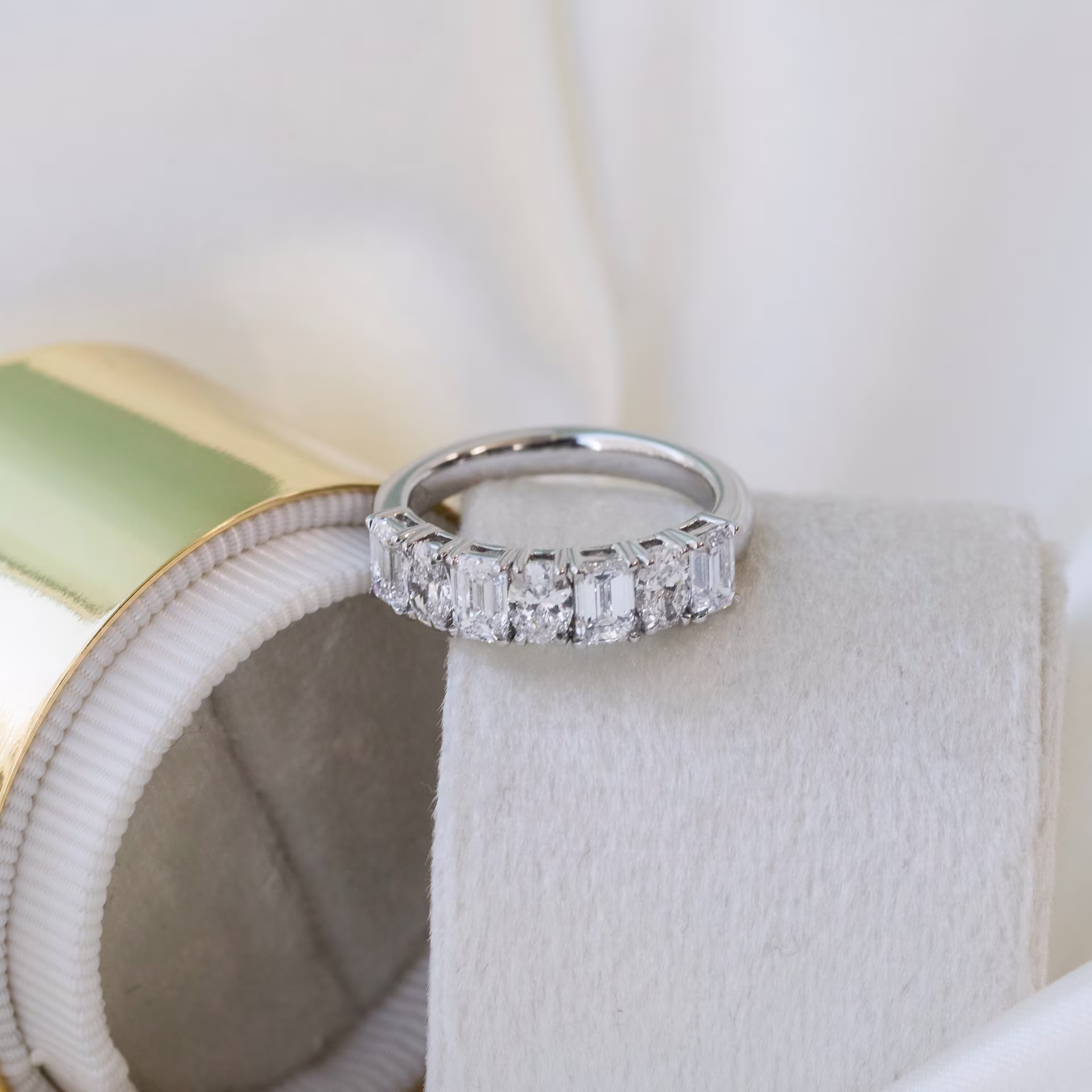 Platinum Emerald and Oval Seven Stone in Platinum 1.8ctw featuring 1.8 Carat Lab Diamonds (Profile View)