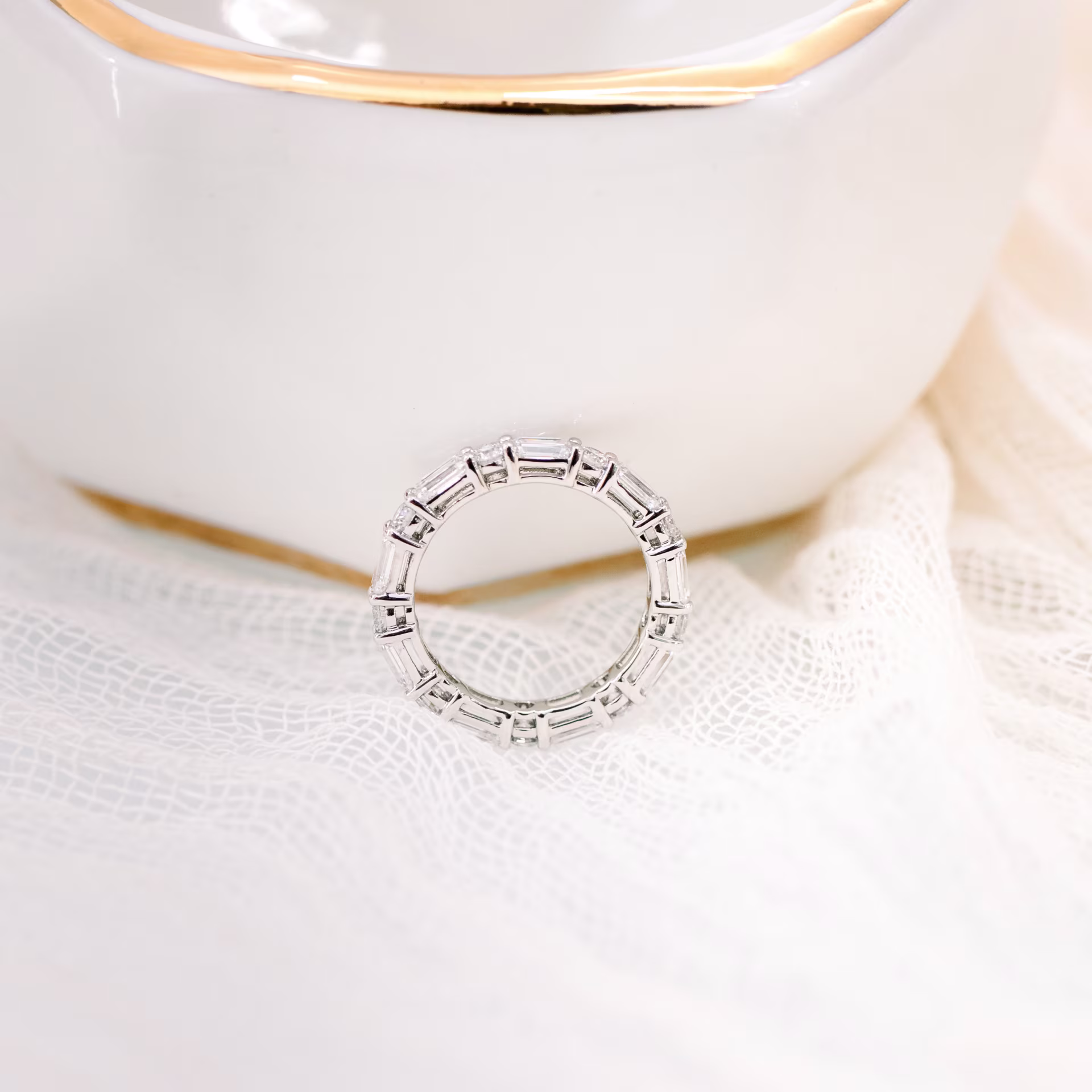 Platinum Emerald and Round East-West Eternity Band in Platinum 2.5ctw featuring 2.5 ctw Diamonds (Profile View)