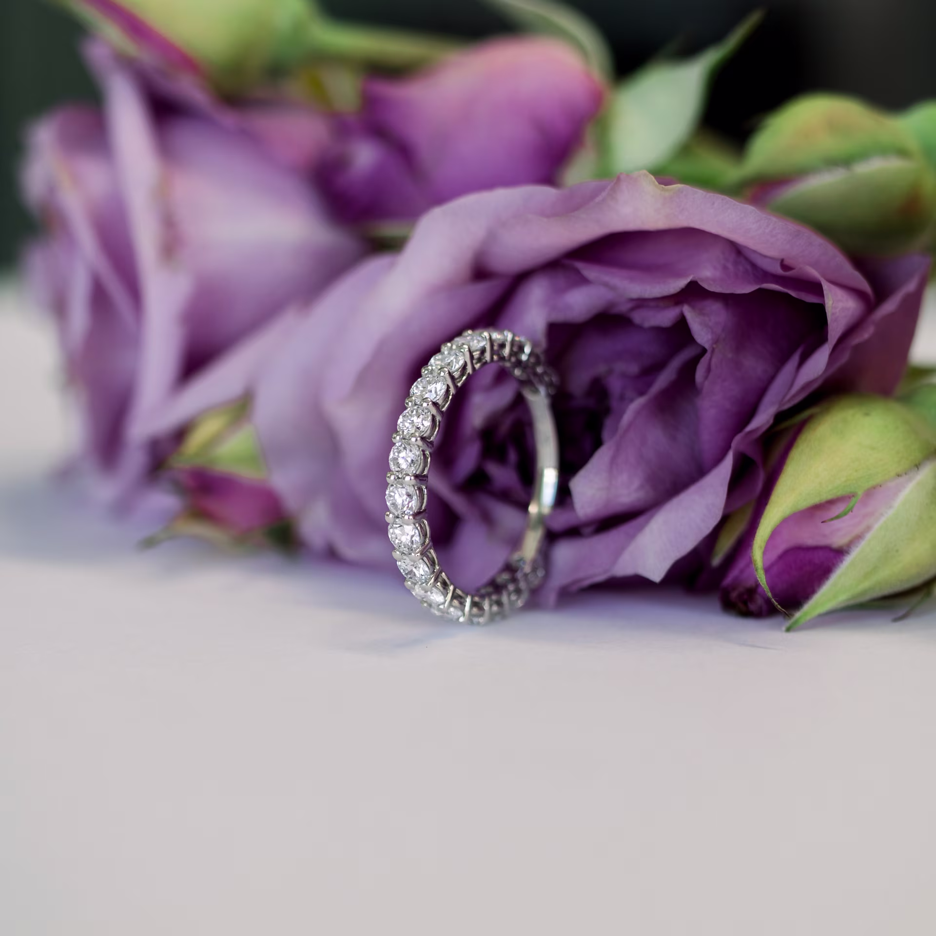 Hand Selected 1.3 Carat Round Man Made Diamonds set in Platinum Prong Set Three Quarter Band (Profile View)