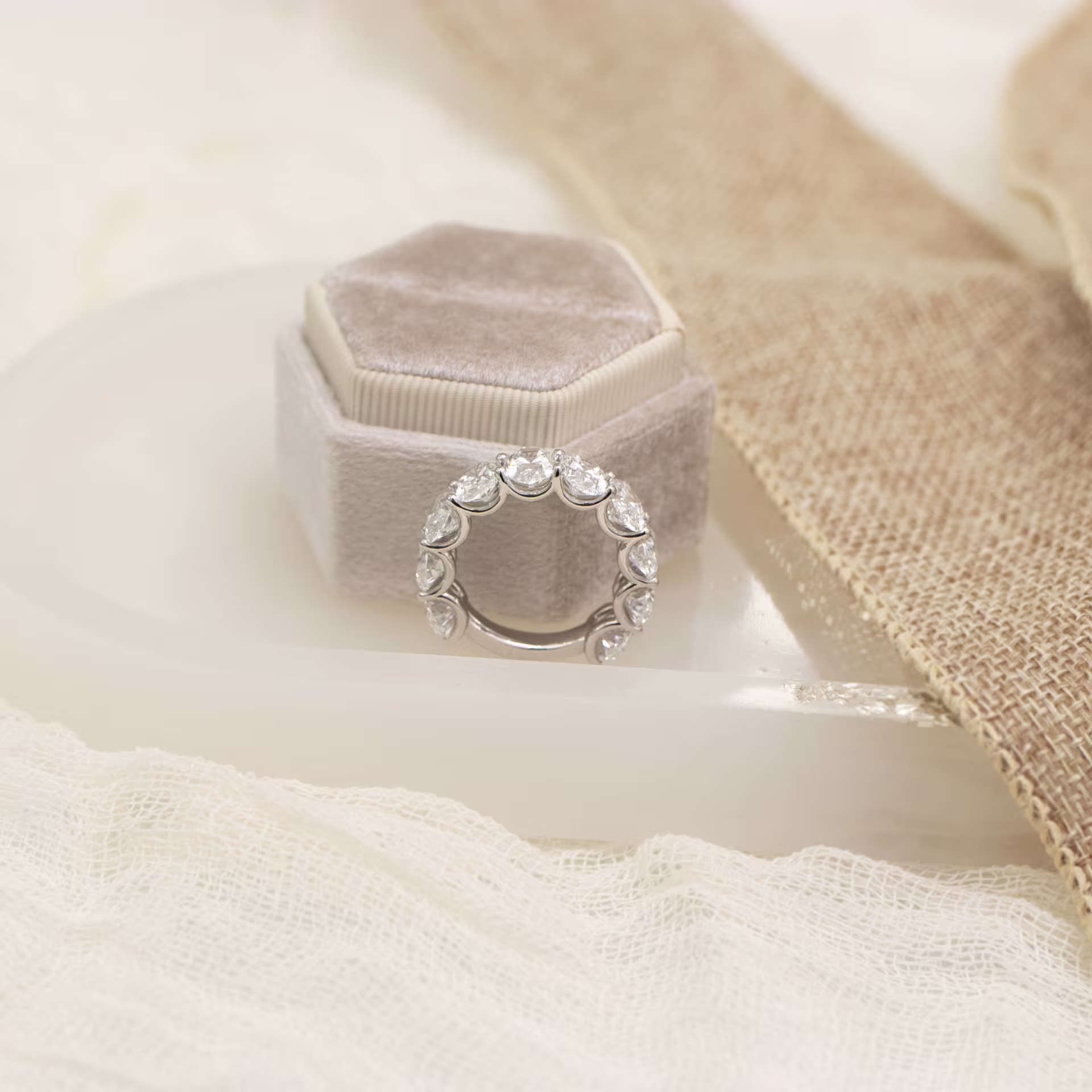 Platinum Oval French U Three Quarter Band featuring Hand Selected 9.0 ctw Lab Diamonds (Profile View)