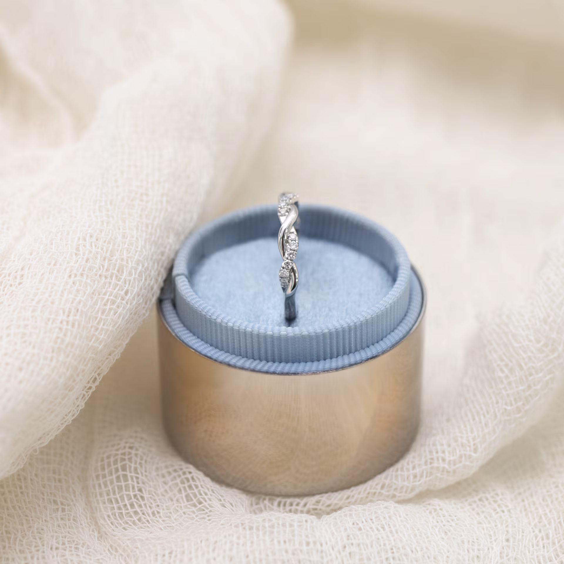 18k White Gold Infinity Twisting Light Half Band in 18k White Gold 0.2ctw featuring High Quality 0.2 Carat Round Lab Grown Diamonds (Side View)