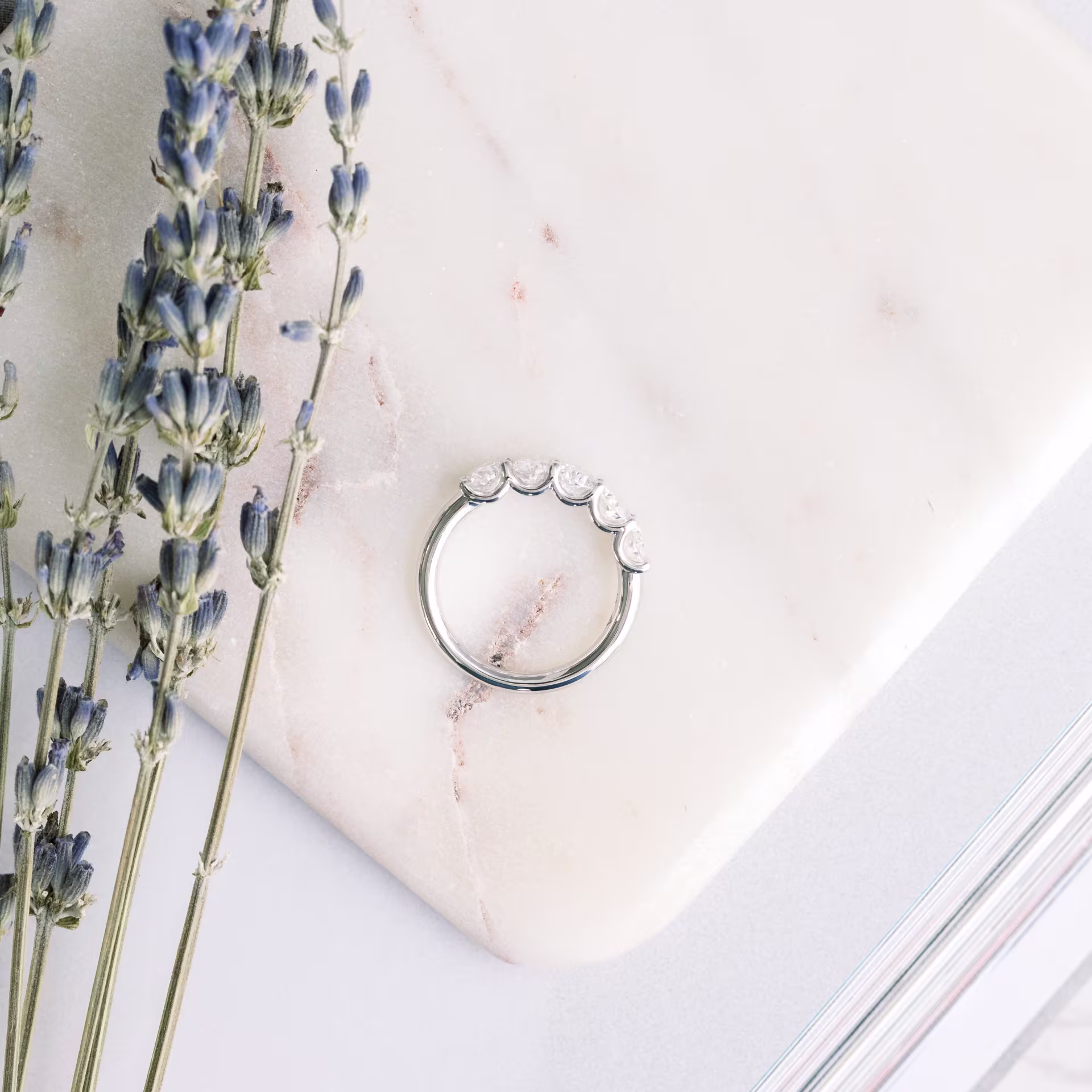 Platinum 2ctw Oval Diamond French U Five Stone Band in Platinum featuring High Quality 2.0 Carat Lab Diamonds (Profile View)