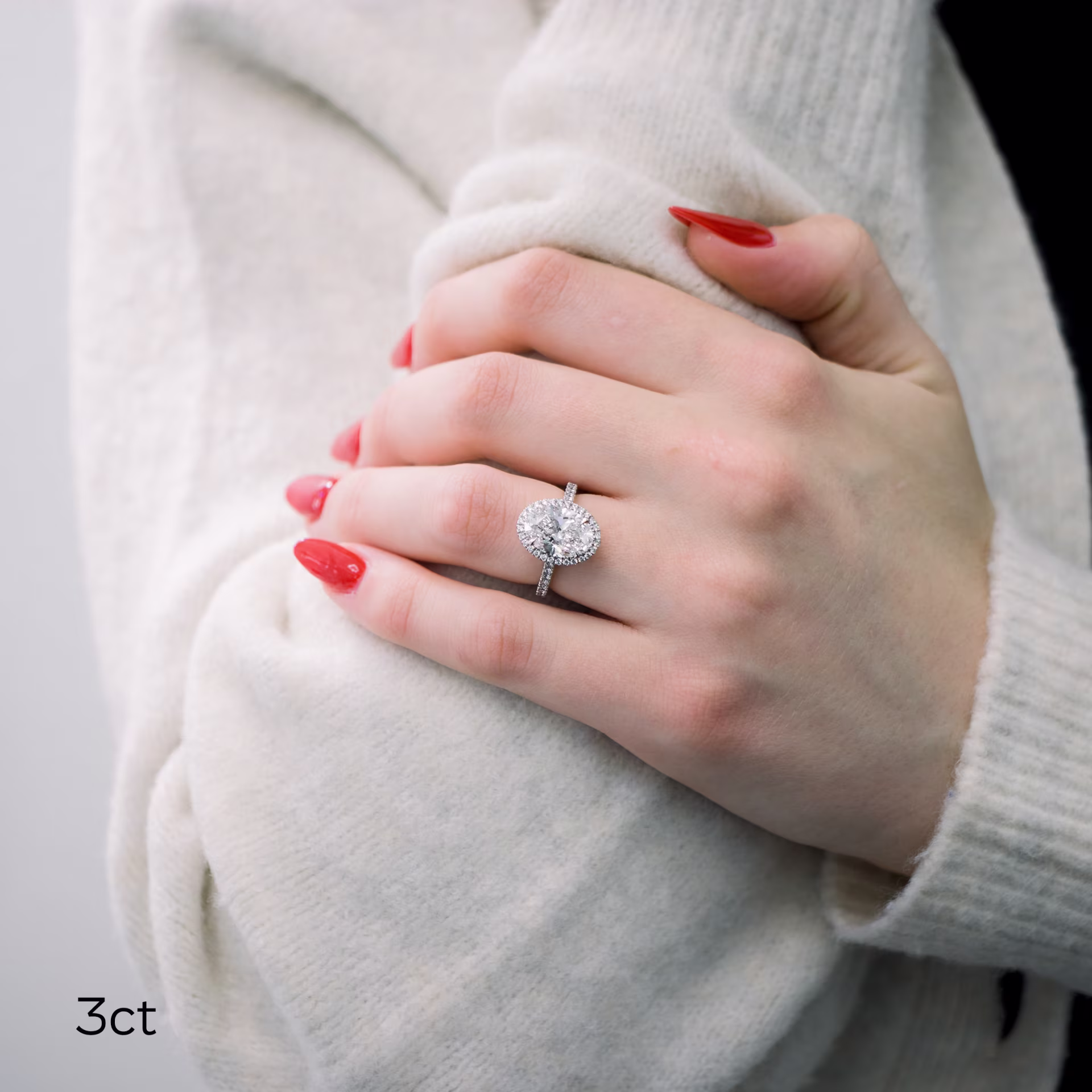 Platinum Oval Halo Pavé Diamond Engagement Ring featuring 3.0 Carat Diamonds (Main View)