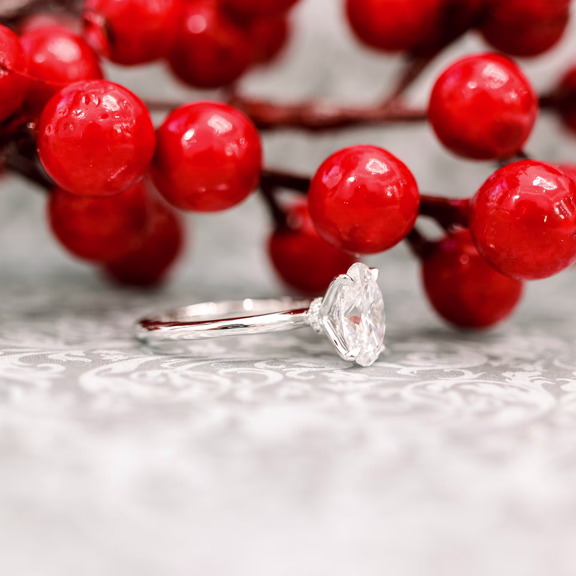 White Gold Oval Classic Four Prong Solitaire Diamond Engagement Ring featuring 2.0 Carat Diamonds (Side View)