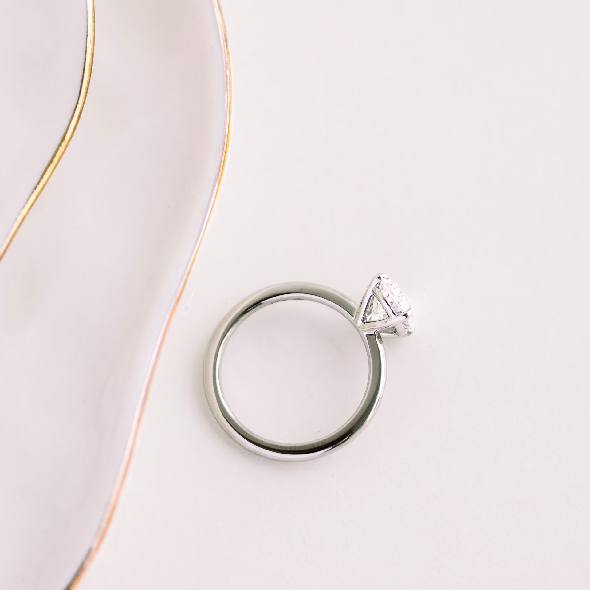 2.0 Carat Lab Diamonds set in Platinum Oval Petite Four Prong Solitaire (Profile View)