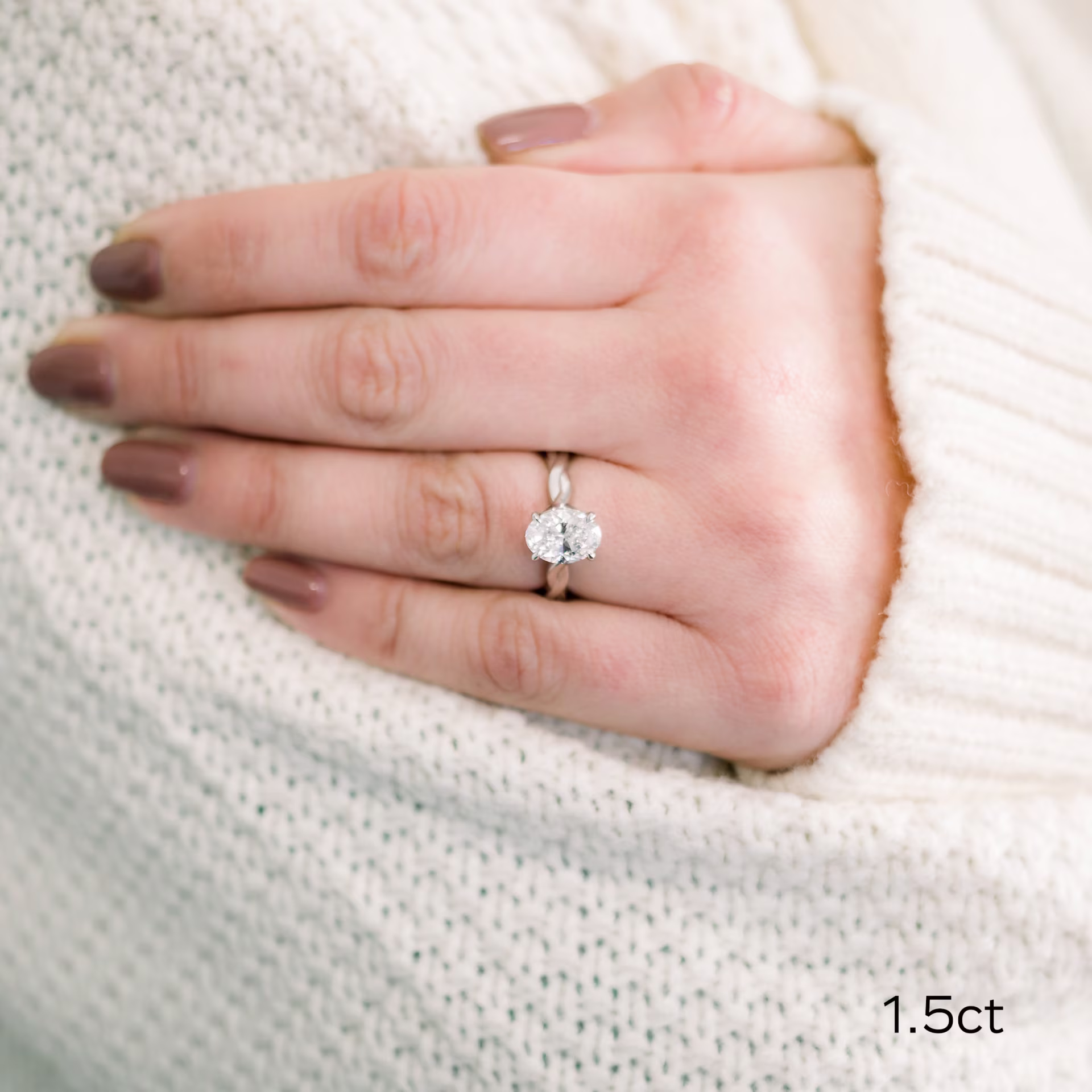 Platinum Twisting Band Solitaire featuring 1.5 ctw Oval Lab Diamonds (Main View)