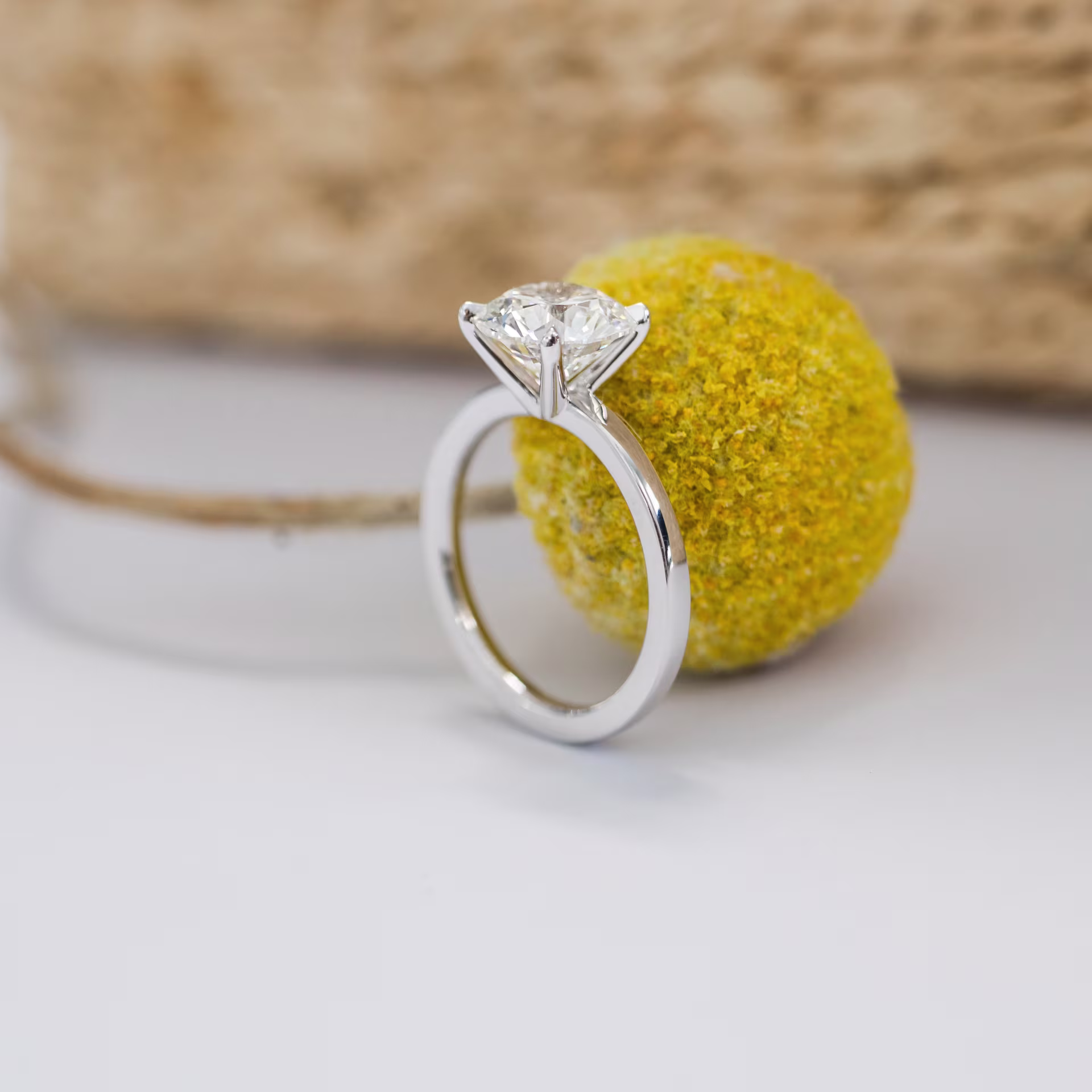 Platinum Round Classic Four Prong Solitaire Diamond Engagement Ring featuring Exceptional Quality 2.0 ctw Lab Diamonds (Profile View)