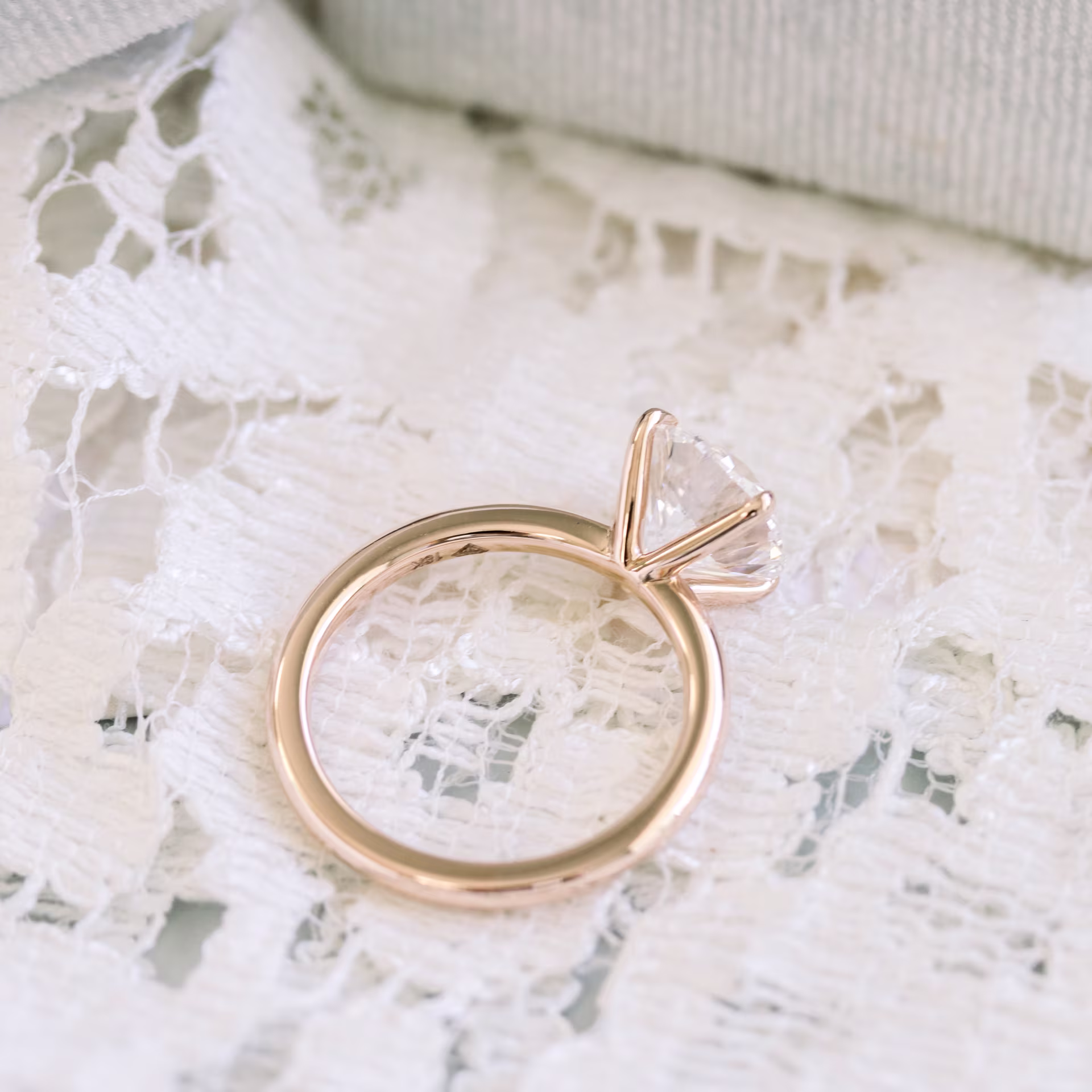 Rose Gold Round Classic Four Prong Solitaire Diamond Engagement Ring featuring 2.5 ct Diamonds (Profile View)