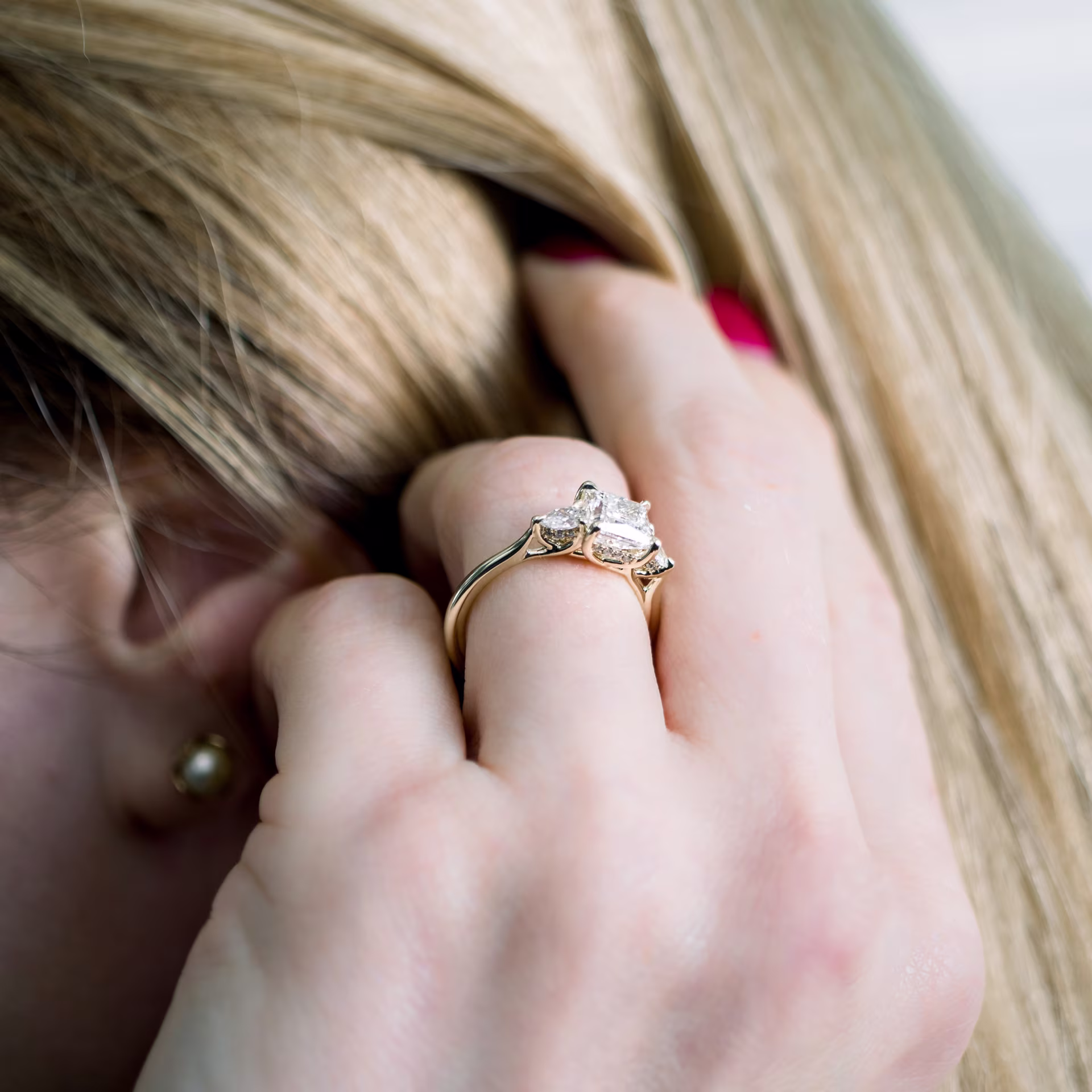 Yellow Gold Princess and Pear Diamond Engagement Ring featuring 1.75 Carat Diamonds (Profile View)