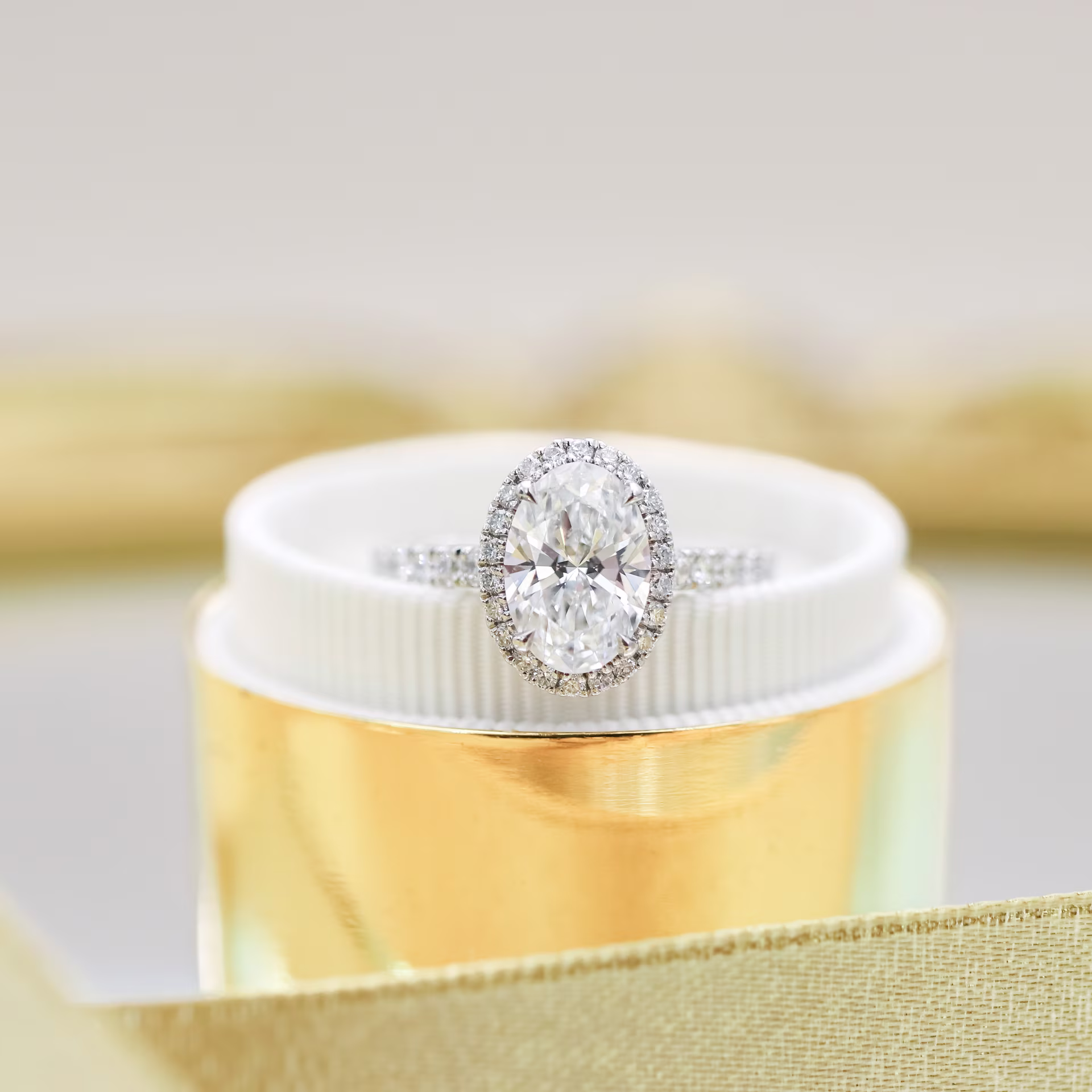 Platinum Oval Halo Pavé Diamond Engagement Ring featuring Exceptional Quality 1.5 ct Lab Grown Diamonds (Main View)