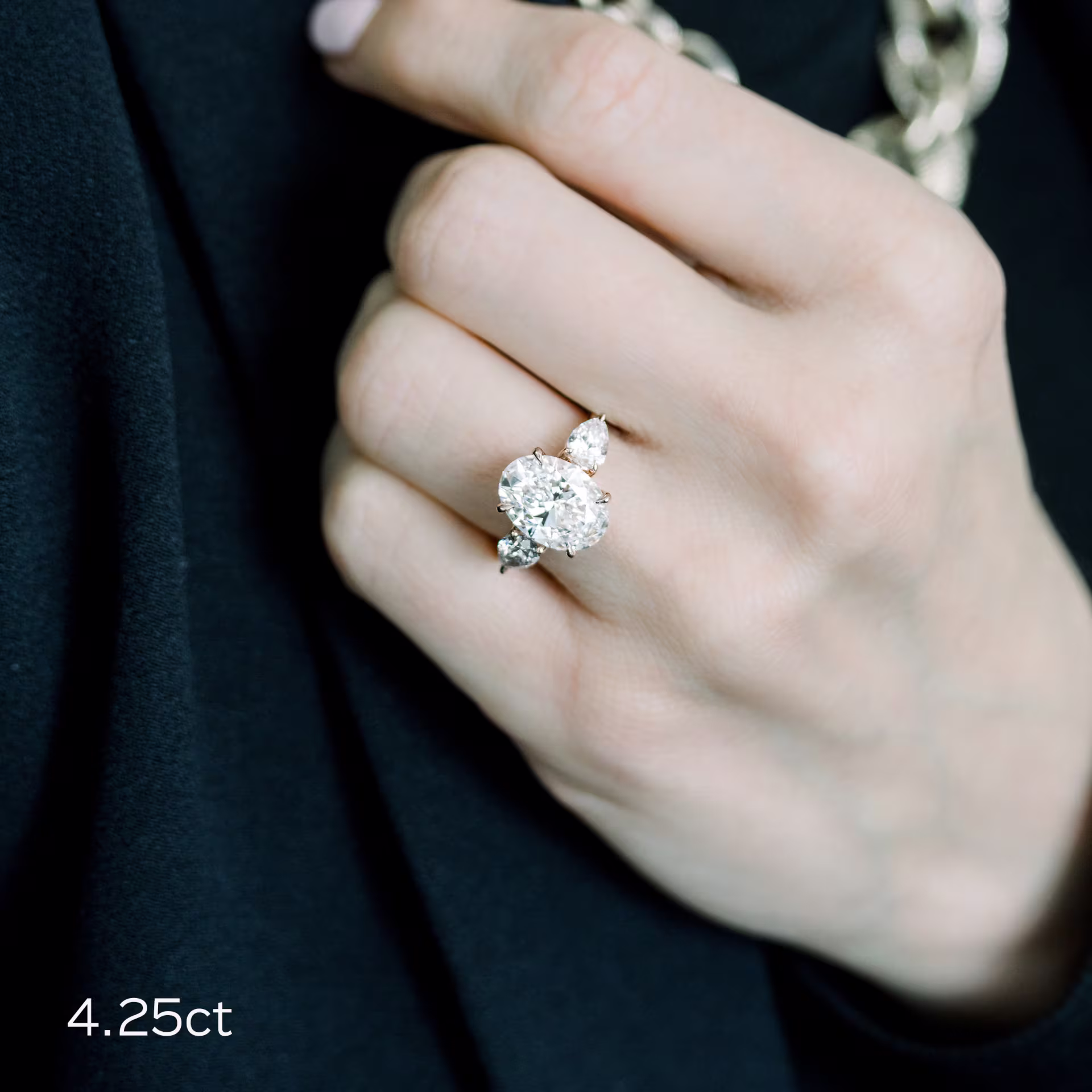 Rose Gold Oval and Pear Diamond Engagement Ring featuring Exceptional Quality 4.25 Carat Synthetic Diamonds (Main View)