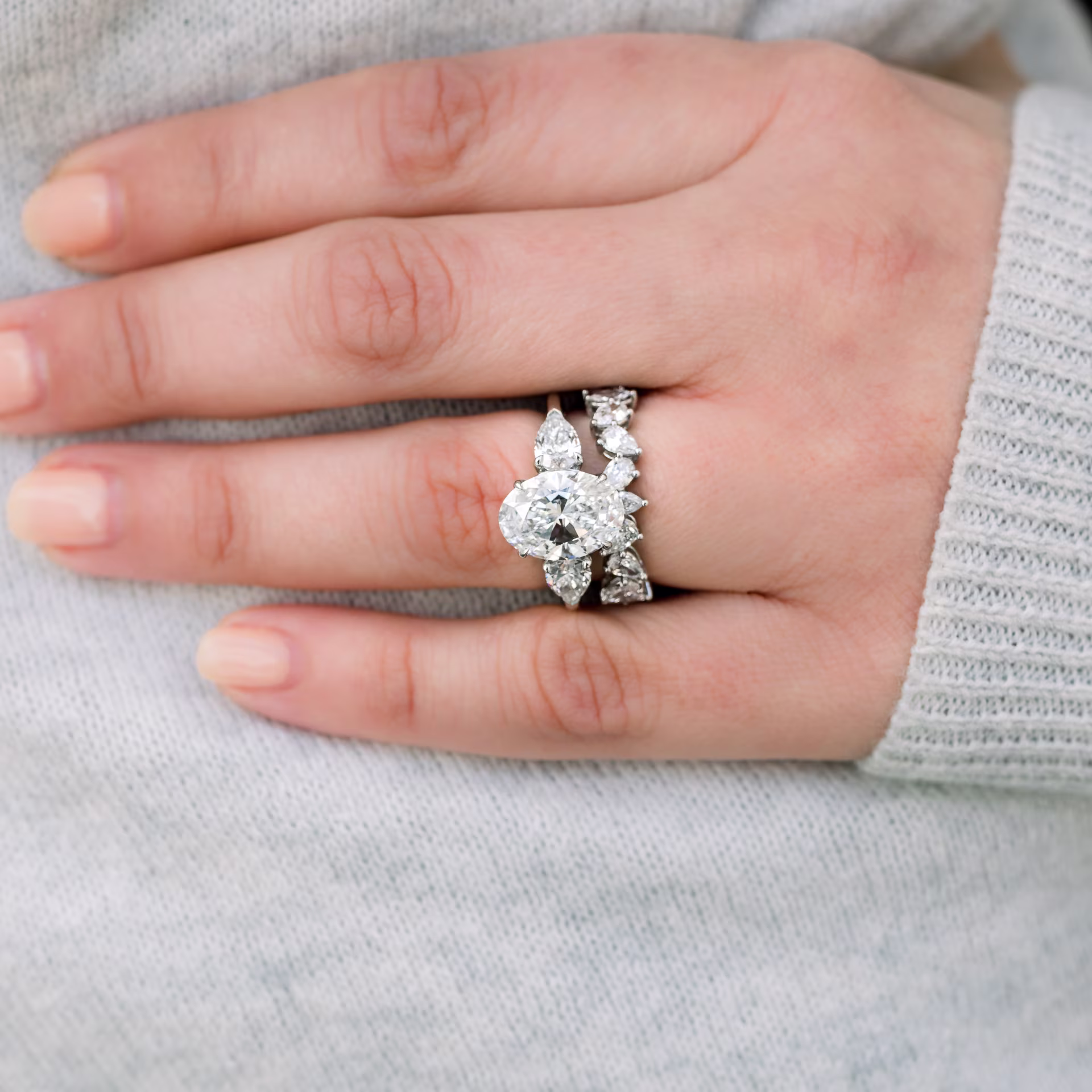 Platinum Oval and Pear Diamond Engagement Ring featuring High Quality 2.75 Carat Synthetic Diamonds (Main View)