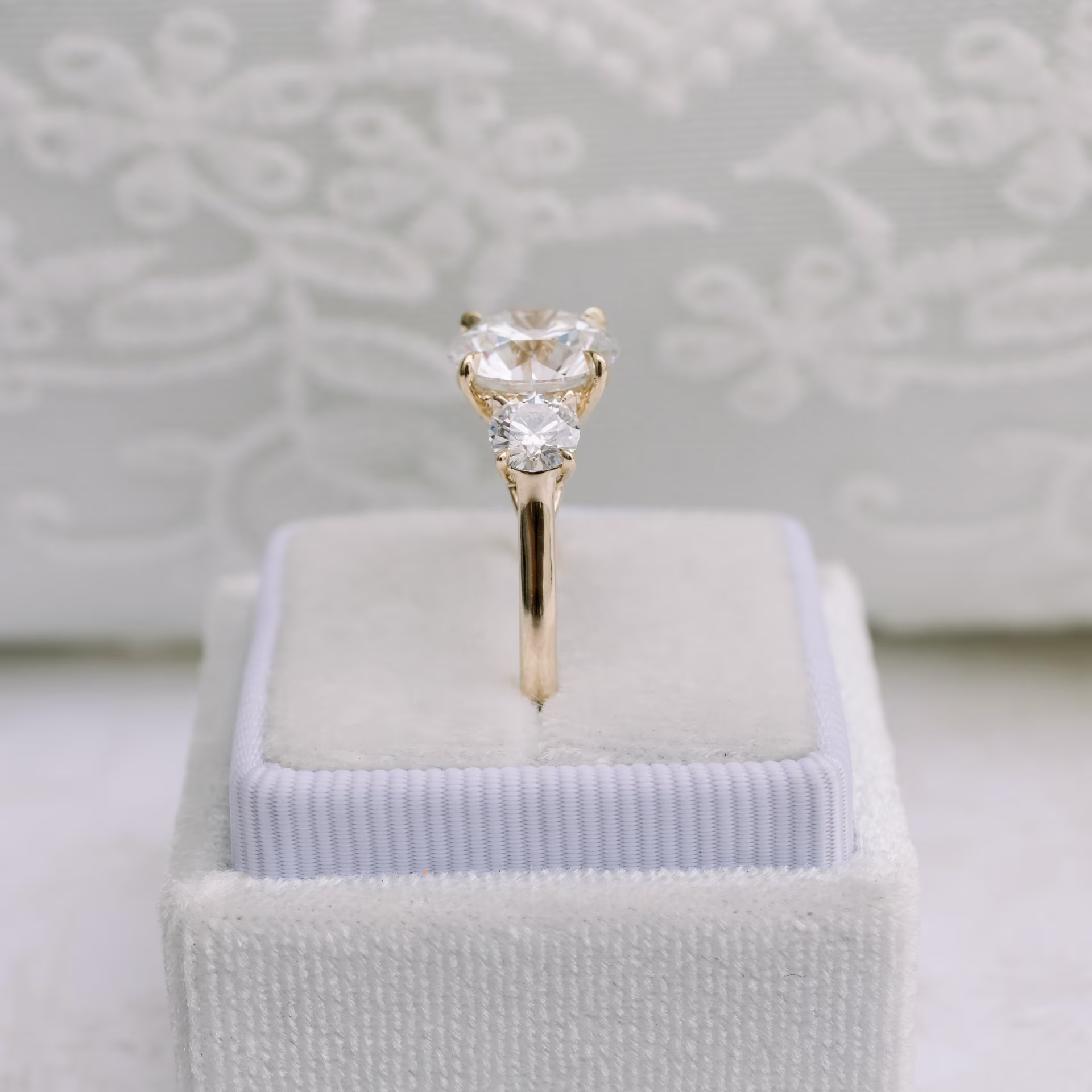 Yellow Gold Round Three Stone Setting featuring 3.0 Carat Synthetic Diamonds (Side View)