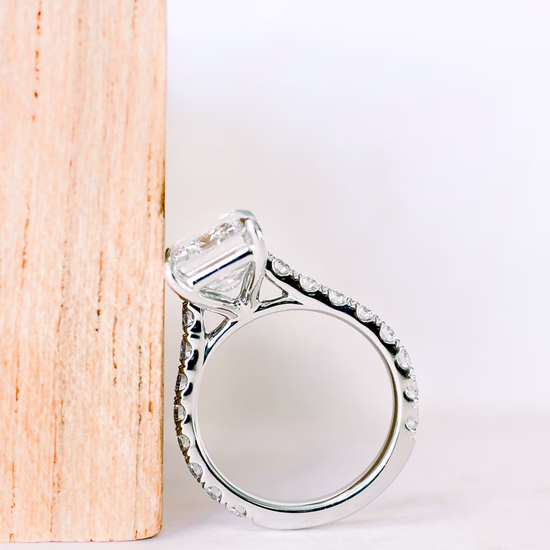 3.0 ctw Lab Diamonds set in Platinum Emerald Cathedral Pavé Diamond Engagement Ring (Profile View)