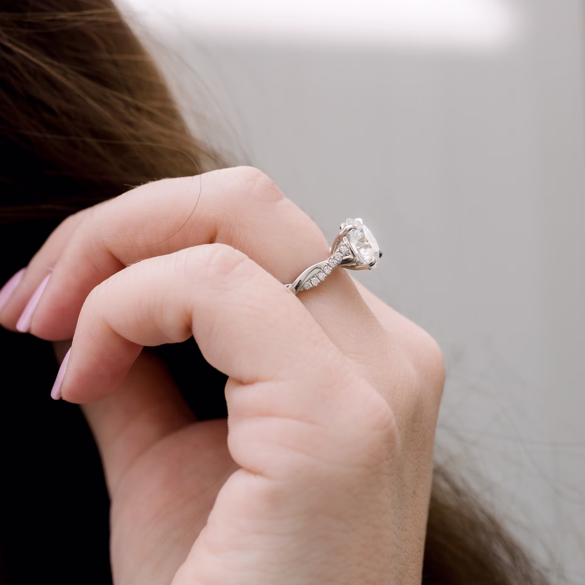 Platinum Infinity Twist Setting featuring 2.75 Carat Diamonds (Side View)