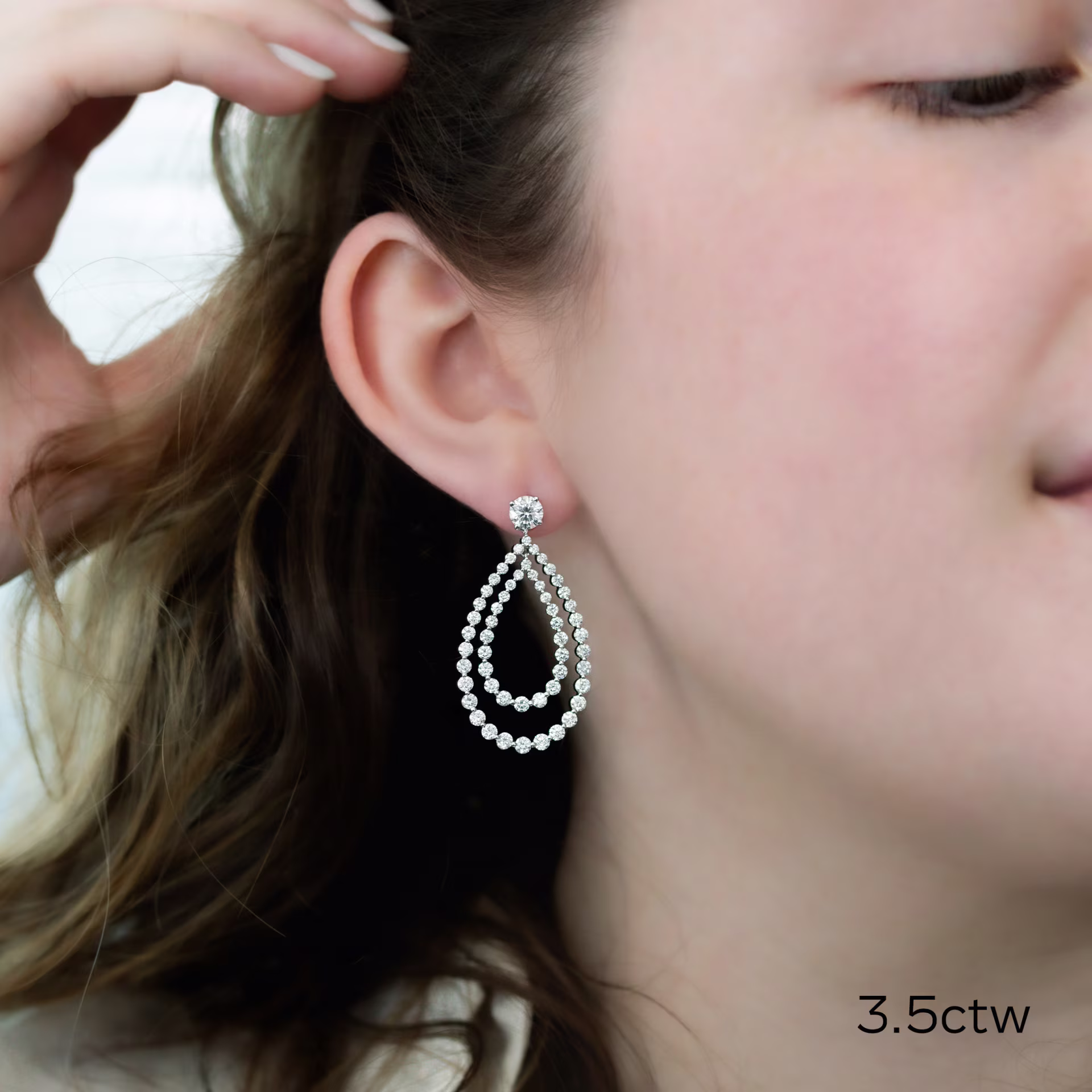 18k White Gold Double Open Pear Earring Jackets featuring Exceptional Quality 3.5 Carat Round Brilliant Diamonds (Main View)