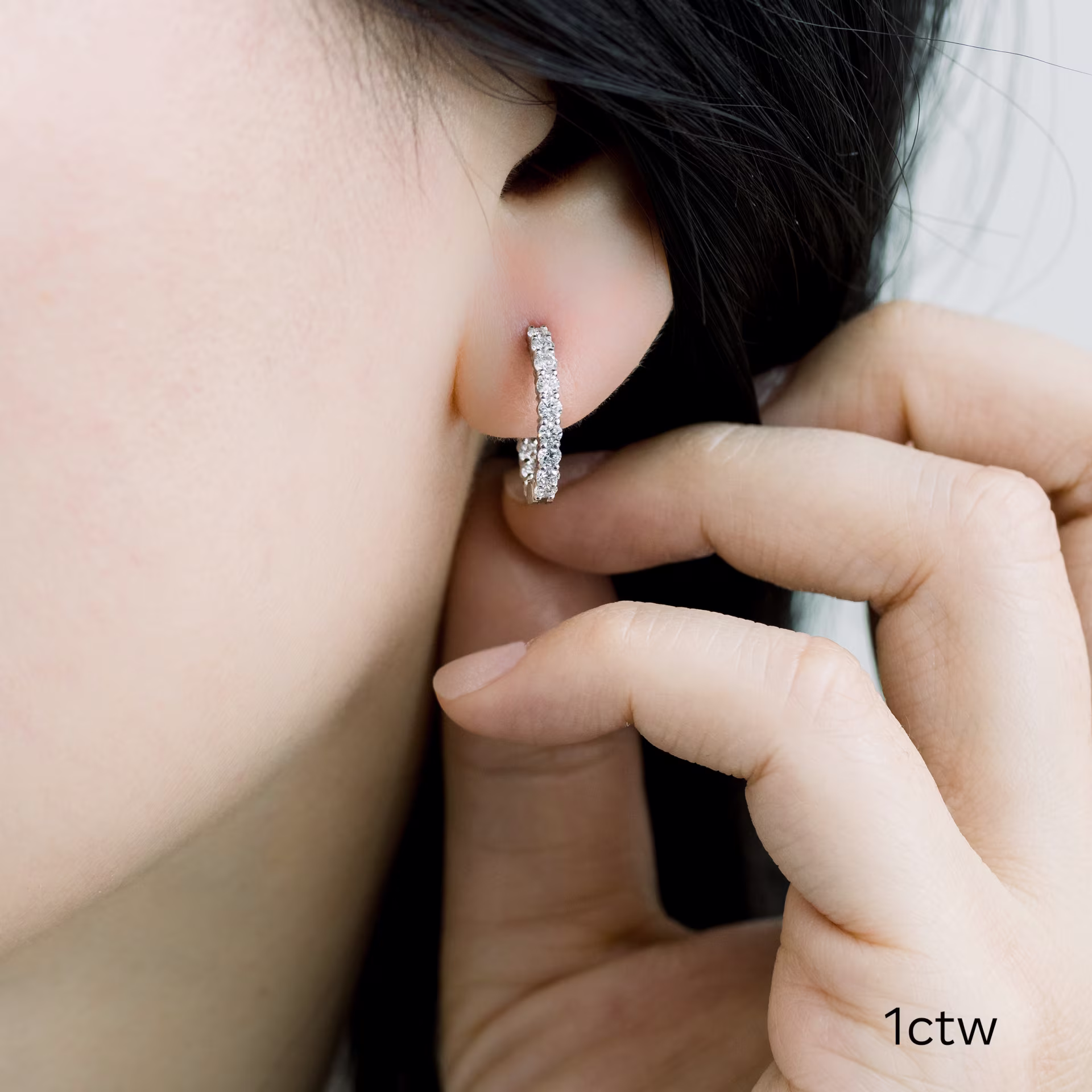 18kt White Gold Prong-Set Huggie Hoop Earrings featuring 1.0 ct Round Brilliant Lab Diamonds (Main View)