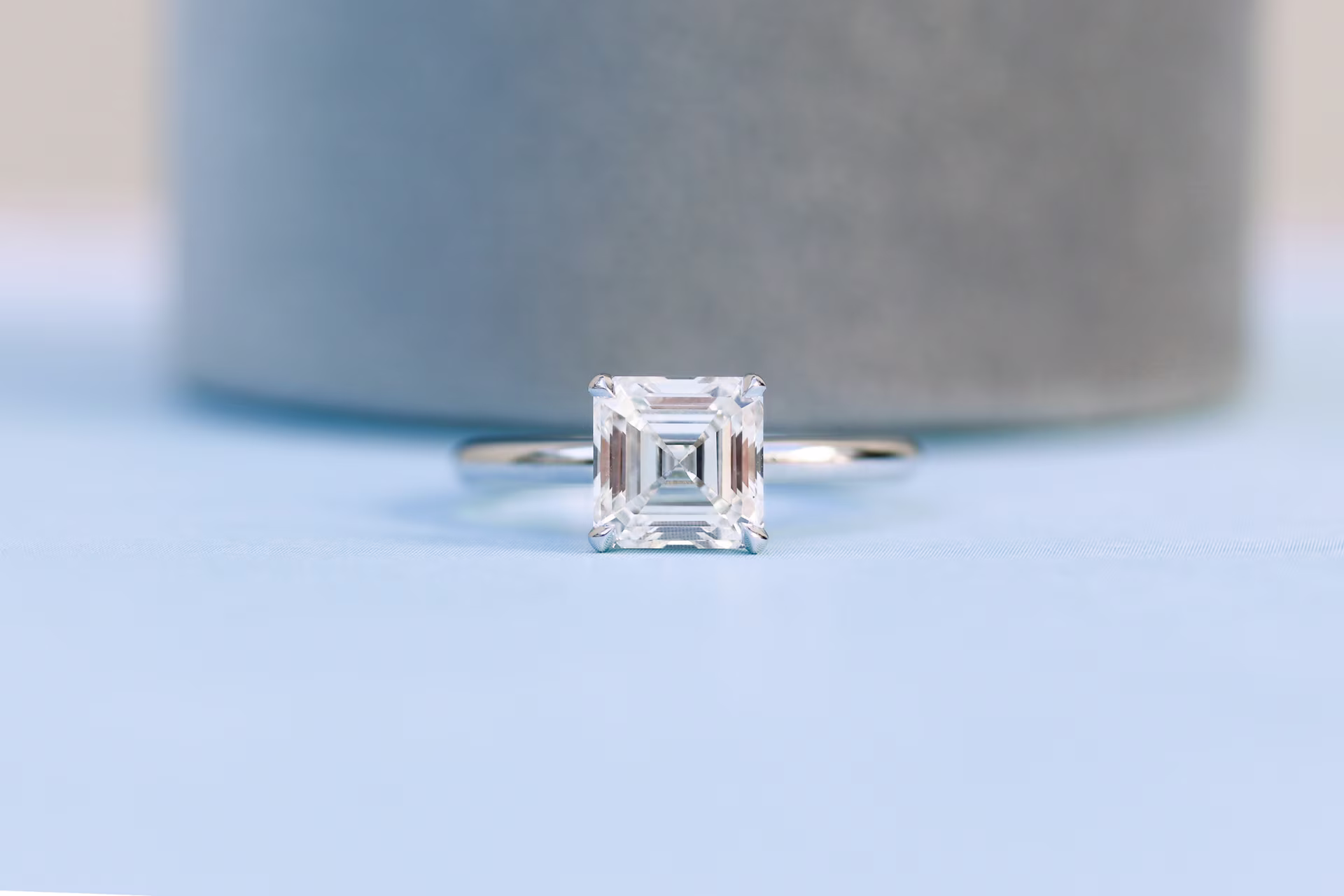 Asscher Petite Four Prong Solitaire Diamond Engagement Ring featuring Lab Diamonds (Profile View)