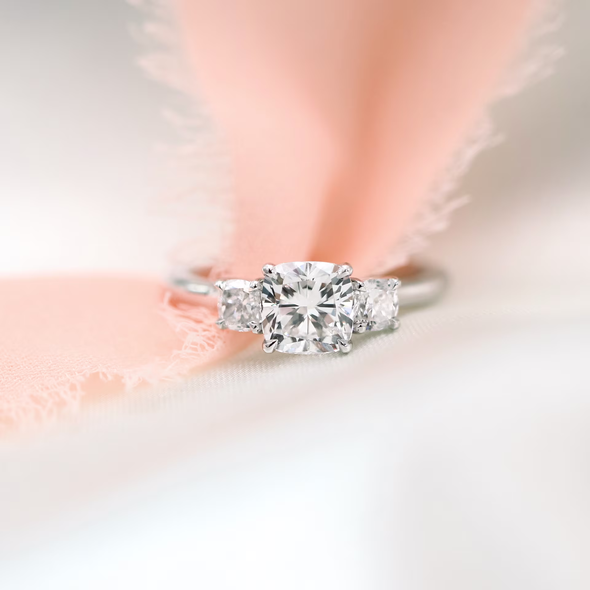 1.25 Carat Diamonds set in Platinum Cushion Three Stone Setting (Main View)