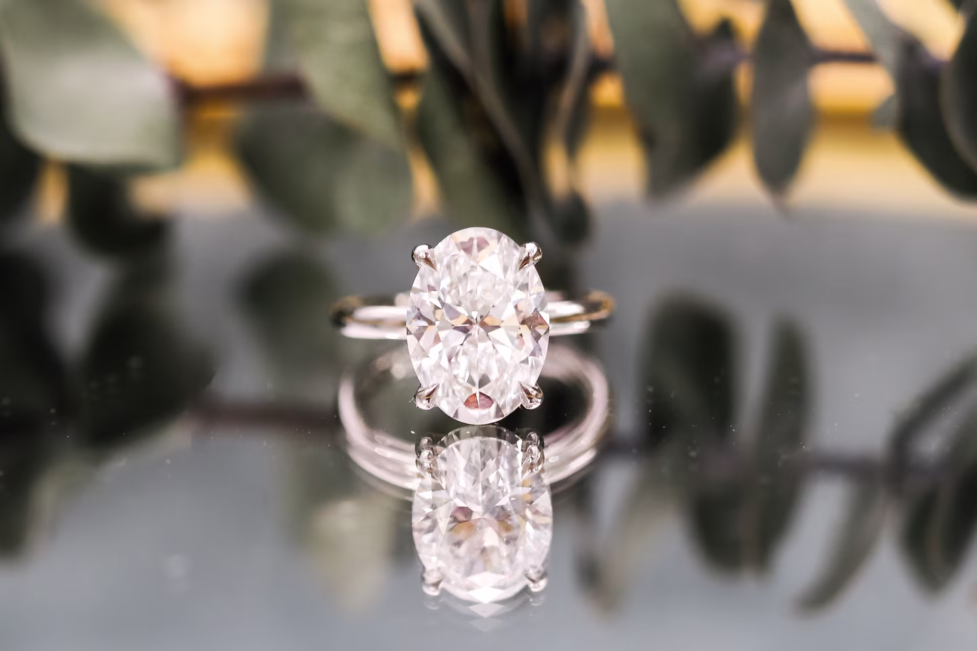 Oval Classic Four Prong Solitaire featuring Diamonds (Profile View)