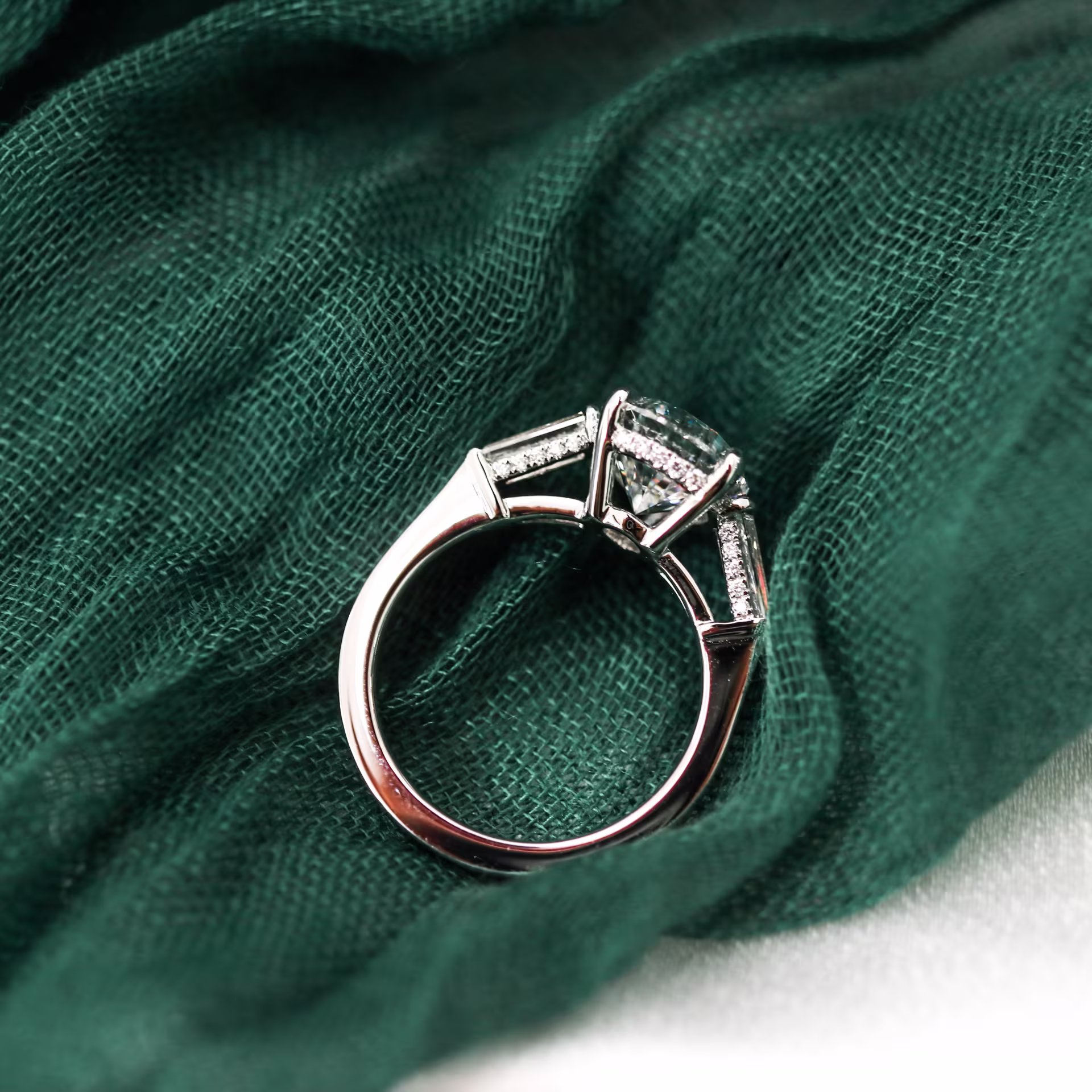 Platinum Pear and Baguette Setting featuring High Quality 3.75 Carat Lab Diamonds (Profile View)