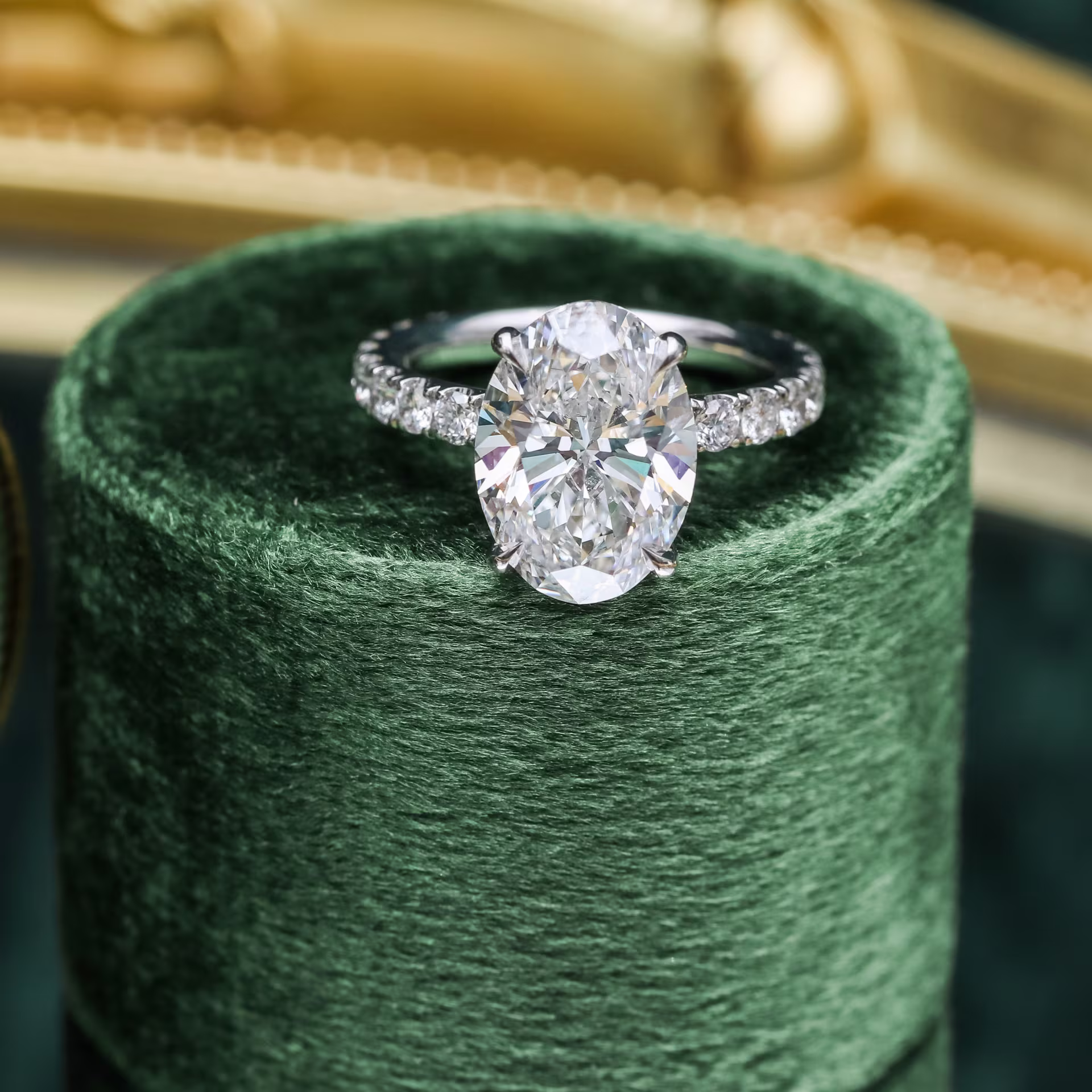 Exceptional Quality 4.25 Carat Lab Diamonds Oval Petite Four Prong Pavé Setting in Platinum (Main View)