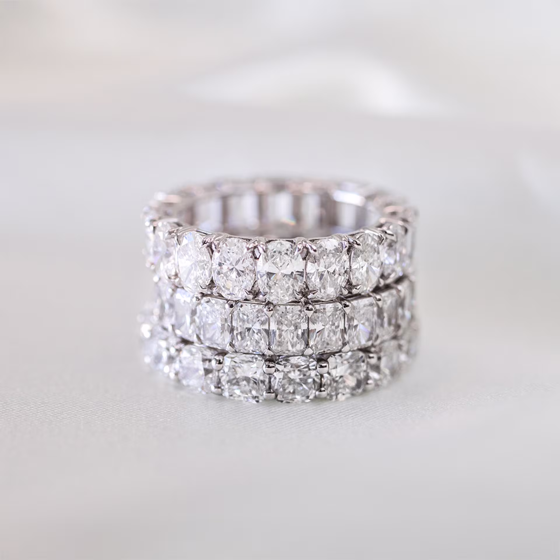 Lab diamond oval eternity band in yellow gold