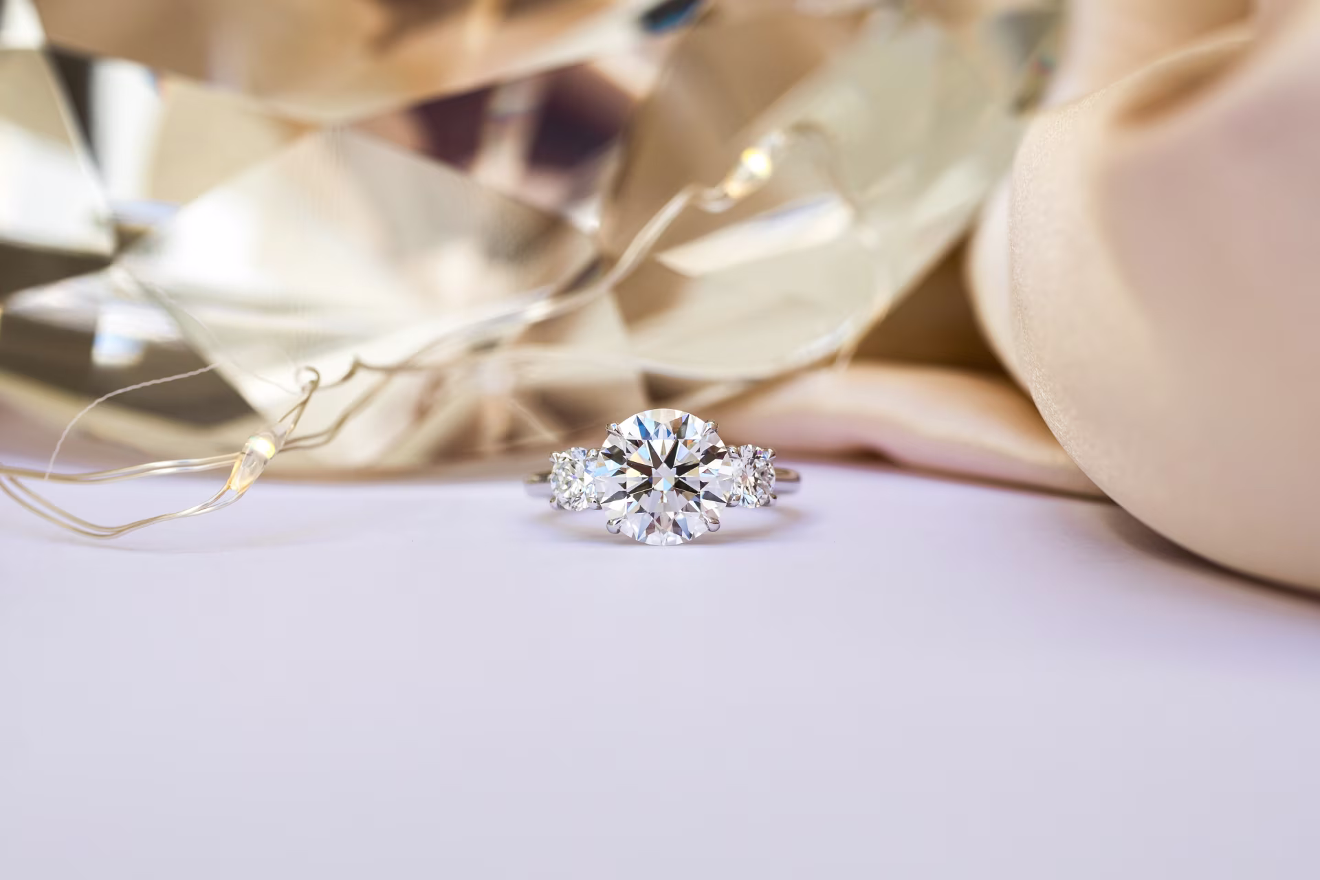 three stone round lab diamond ring in platinum