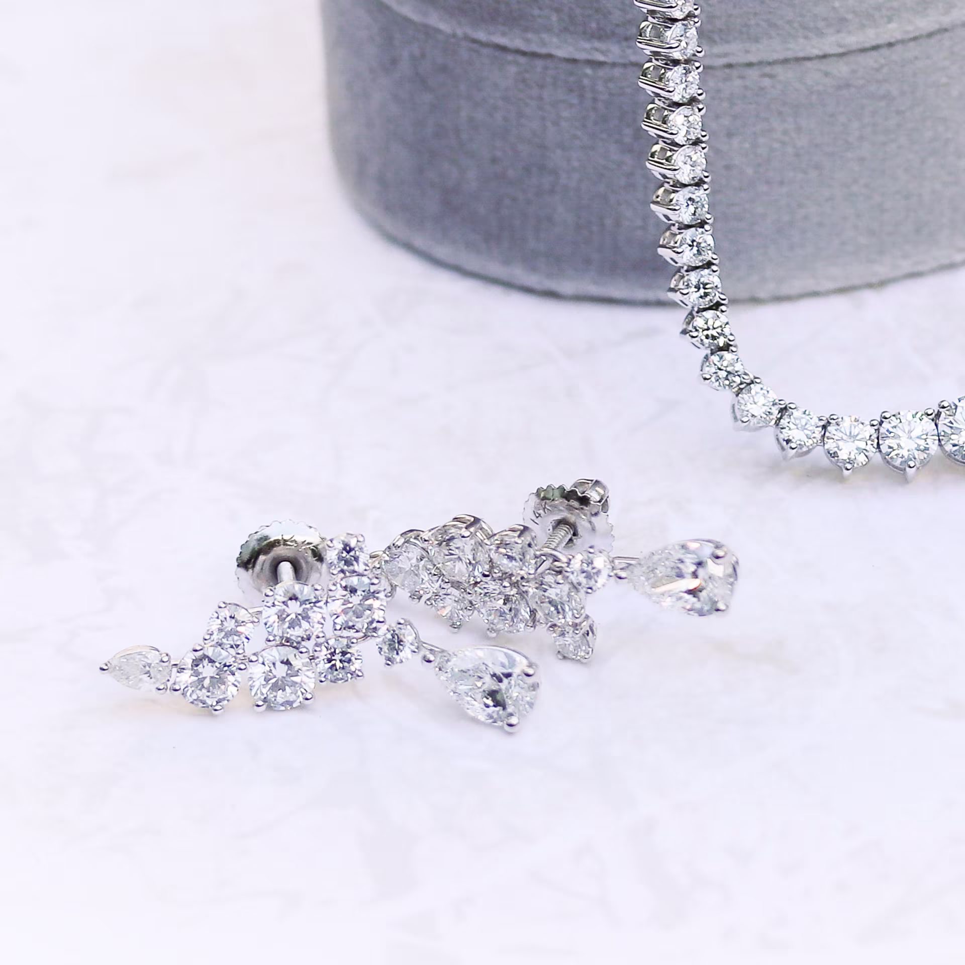 Exceptional Quality Lab Created Diamonds set in White Gold Round and Pear Cluster Duet Earrings (Side View)